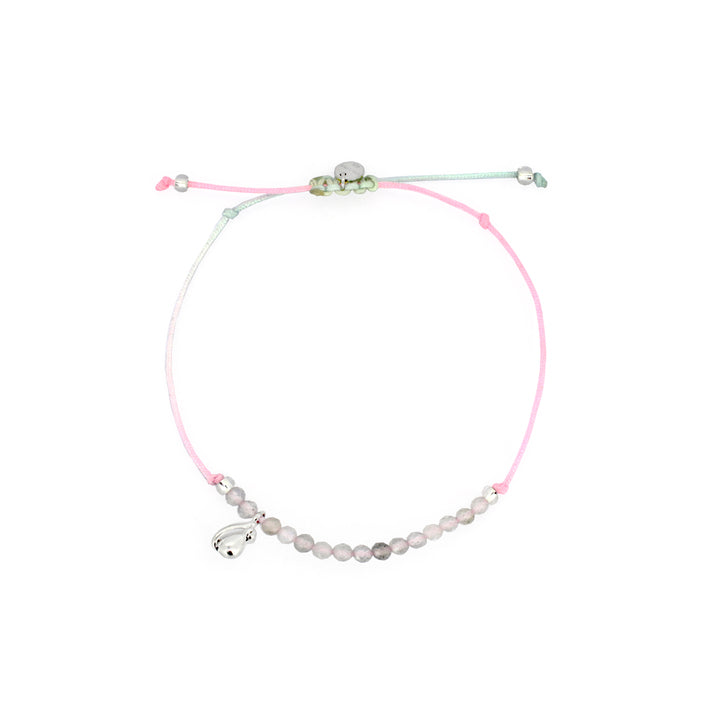 Adjustable Musika bracelet with pastel colors and silver detail.