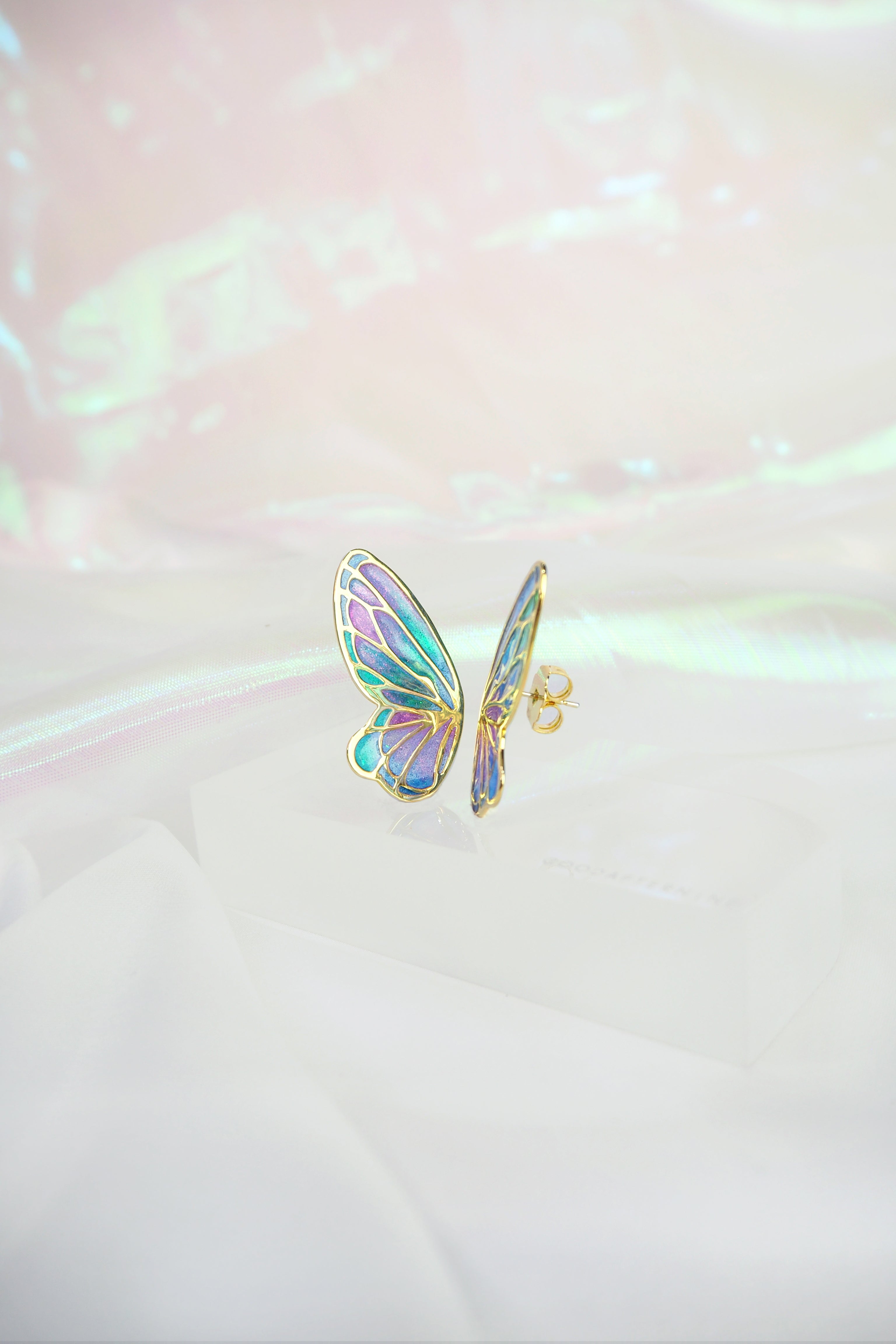 Enamel butterfly earrings featuring a stunning color palette with detailed craftsmanship