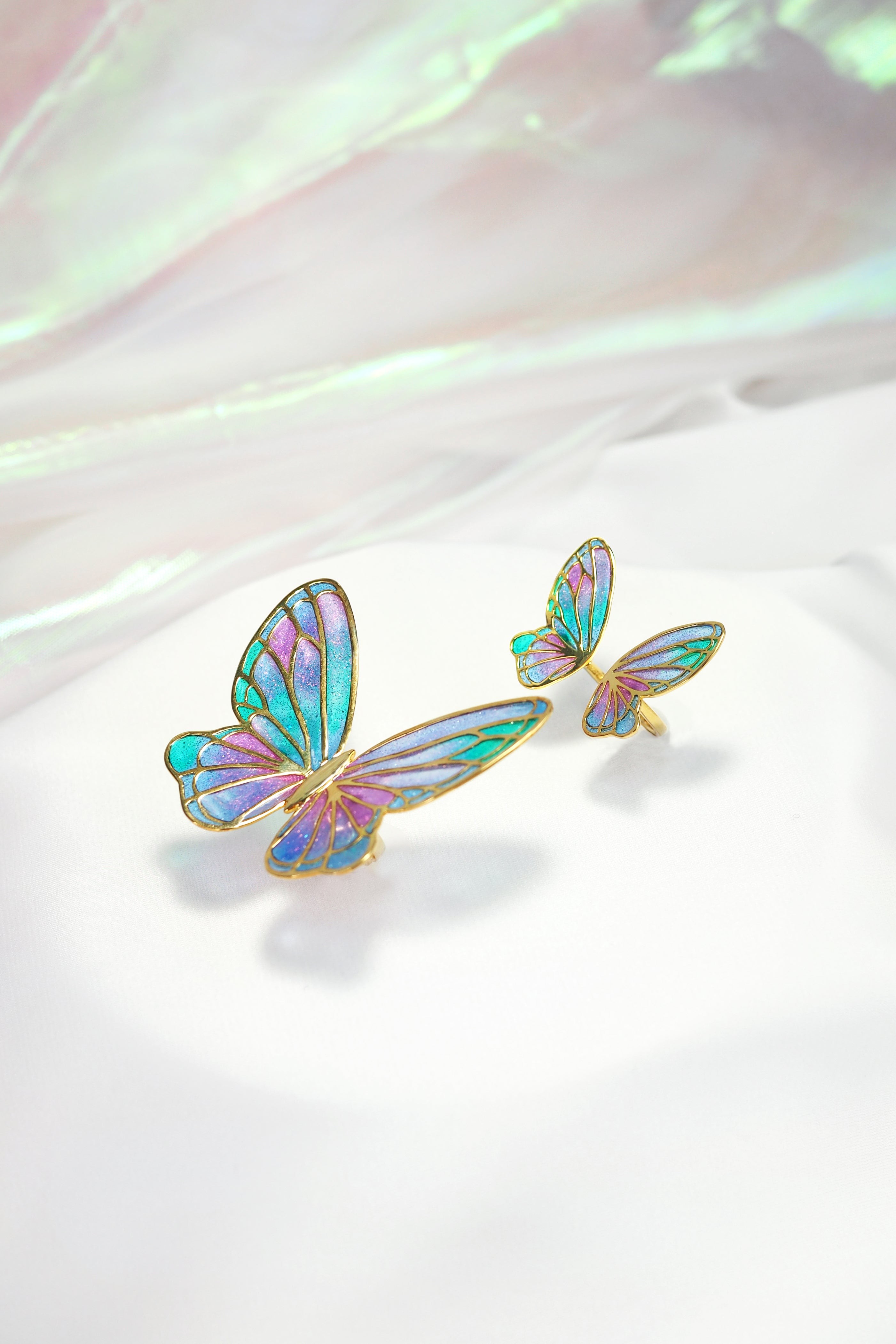 Couple of Enamel butterfly ring featuring a stunning color palette with detailed craftsmanship