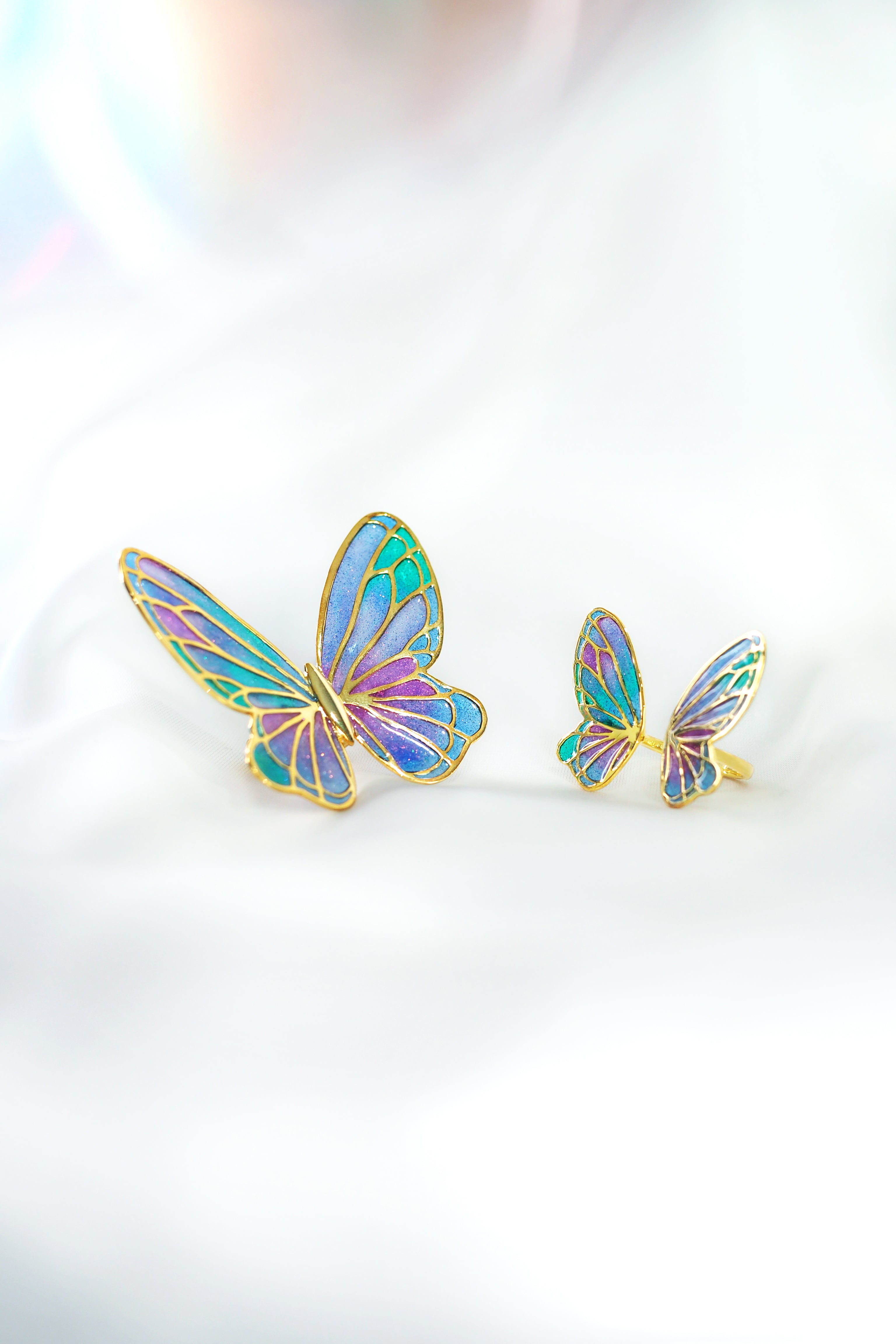 Set of artistic ring with pastel butterfly wing design