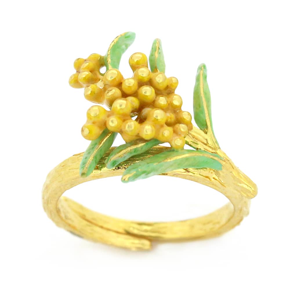 Nature-inspired stacking ring set featuring a fox, butterfly, and flower.