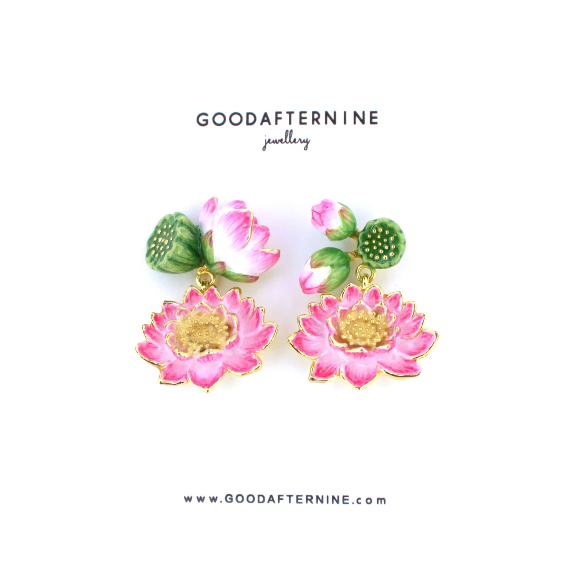 Handmade earrings featuring pink lotus flowers with gold accents and green decorative elements.