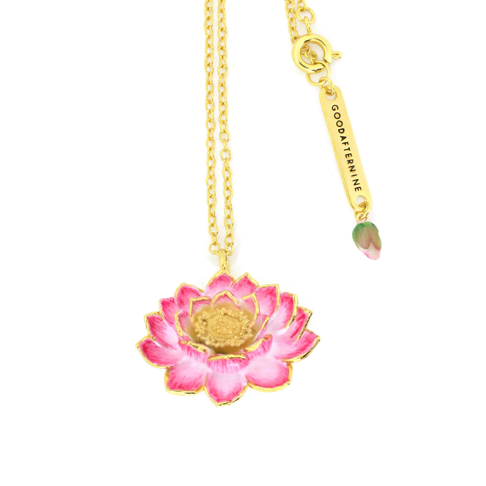 A gold chain necklace features a pink lotus flower pendant, intricately detailed with gold accents.