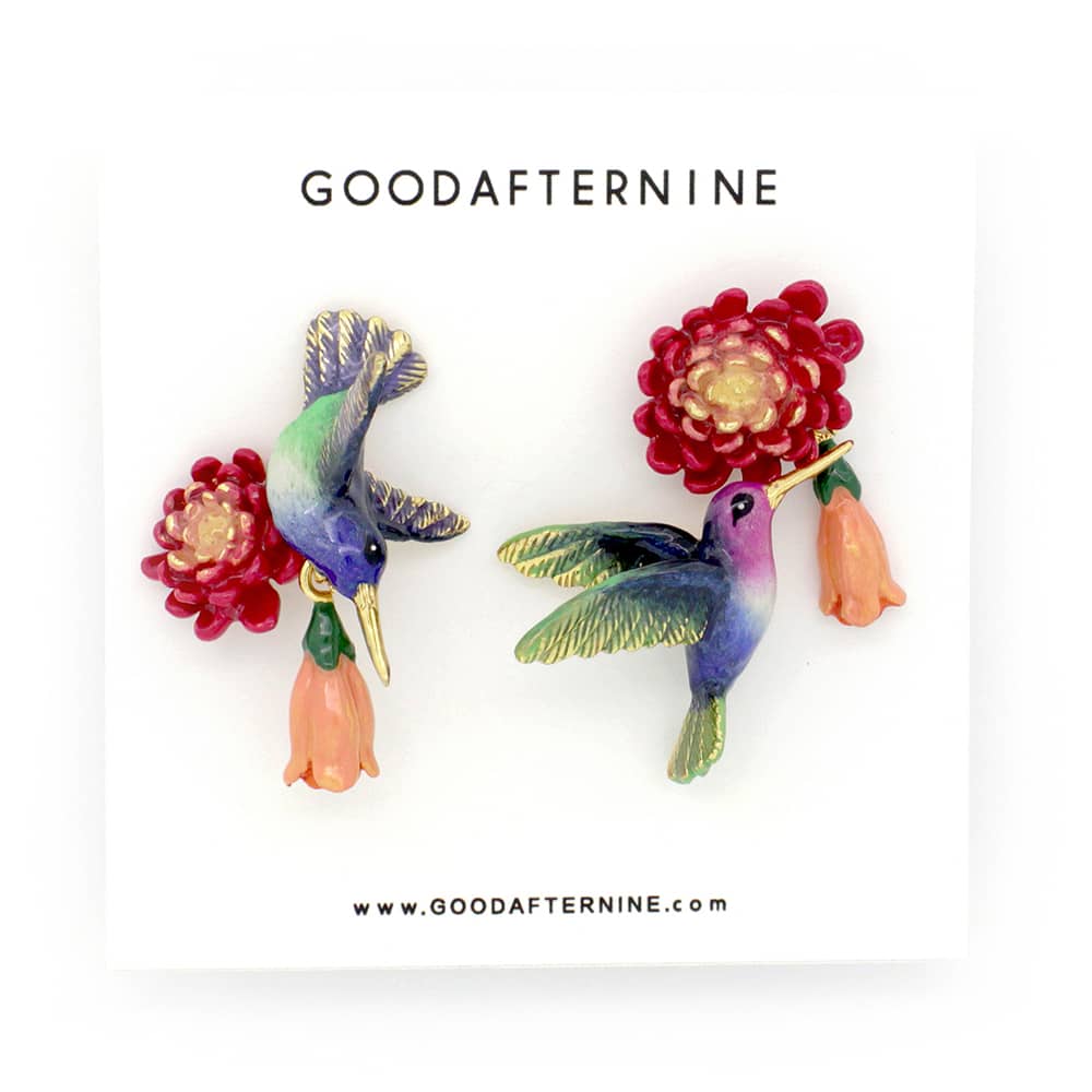 Handmade earrings showcasing colorful hummingbirds and flowers