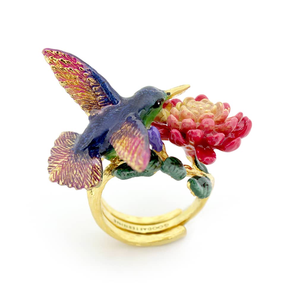 Unique floral ring featuring a hummingbird and vibrant flowers, perfect for nature lovers.