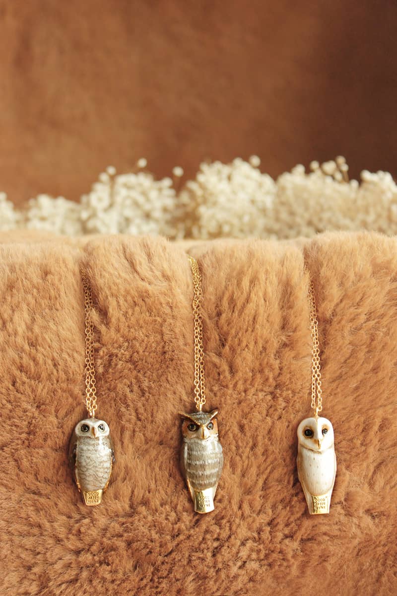 Unique owl whistle necklace with intricate detailing.