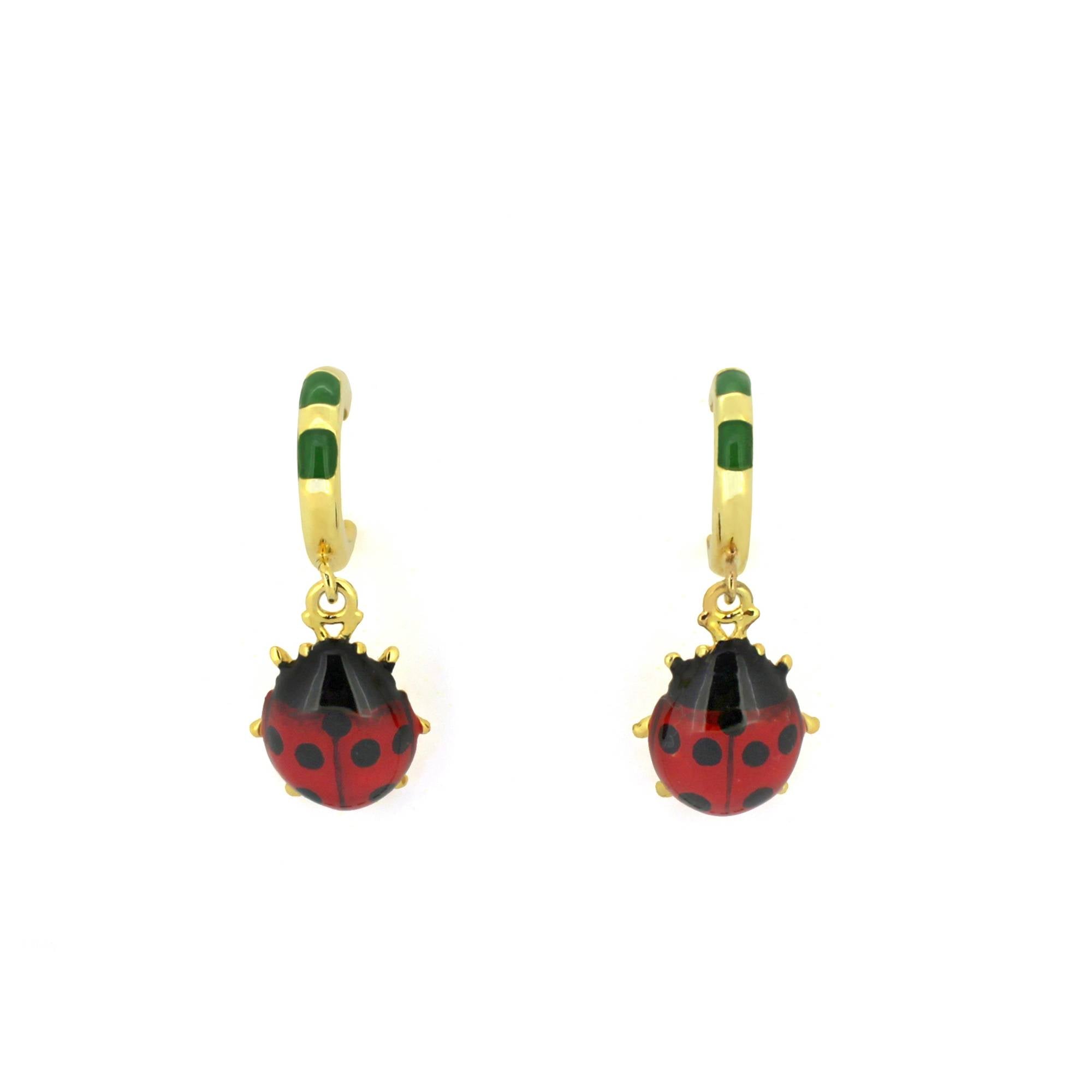 Nature-inspired earrings with ladybug charms.