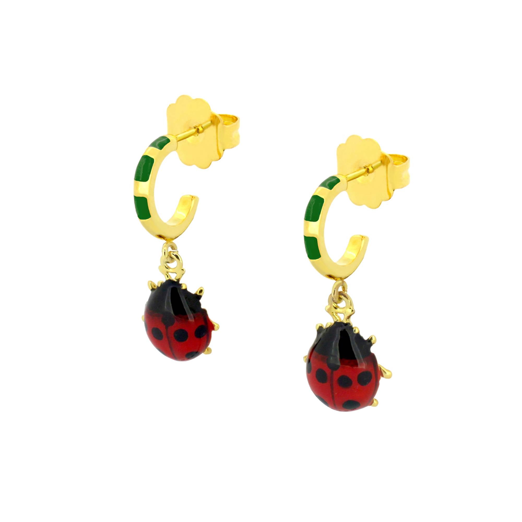 Nature-inspired earrings with ladybug charms.