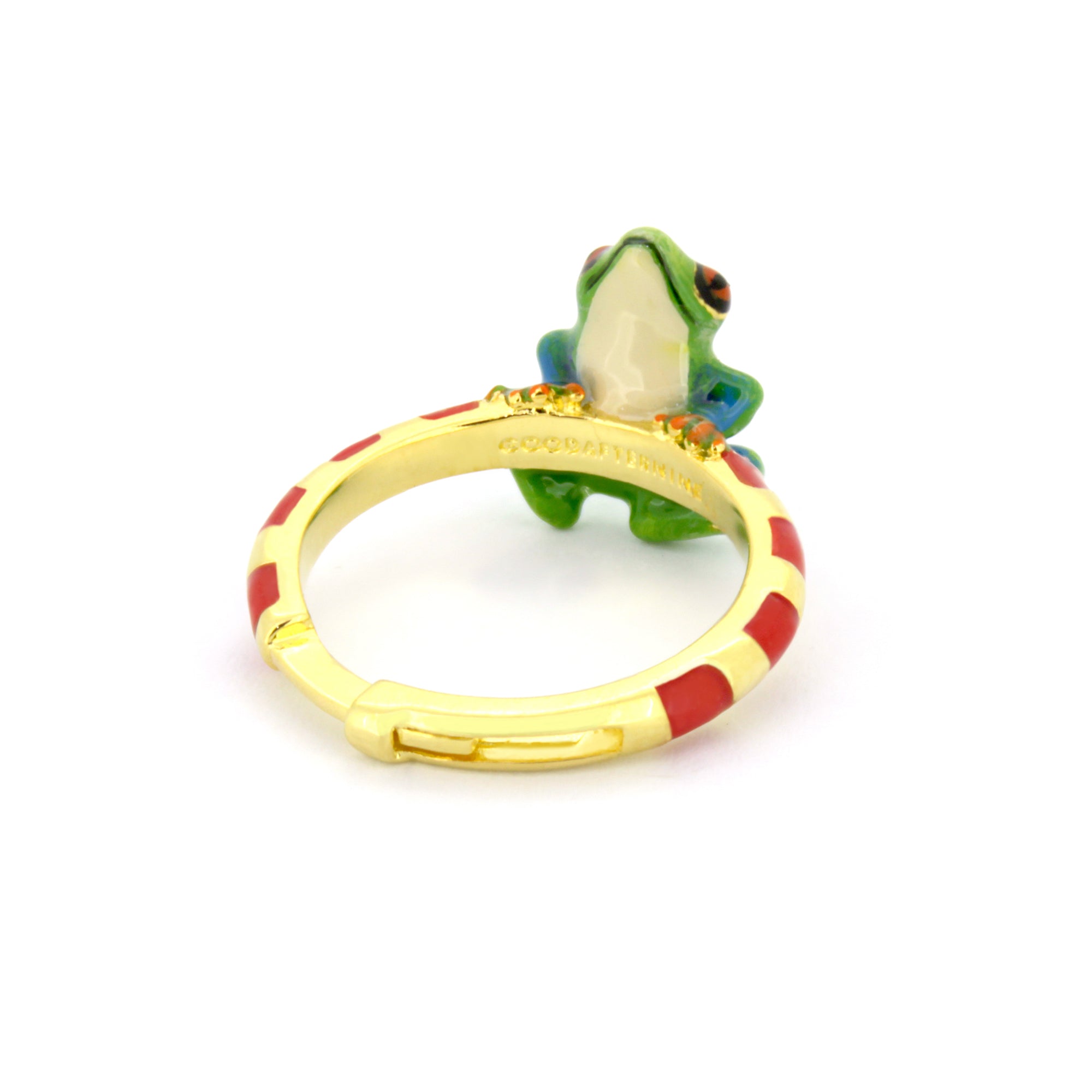 Playful frog ring designed in gold with a red striped pattern.