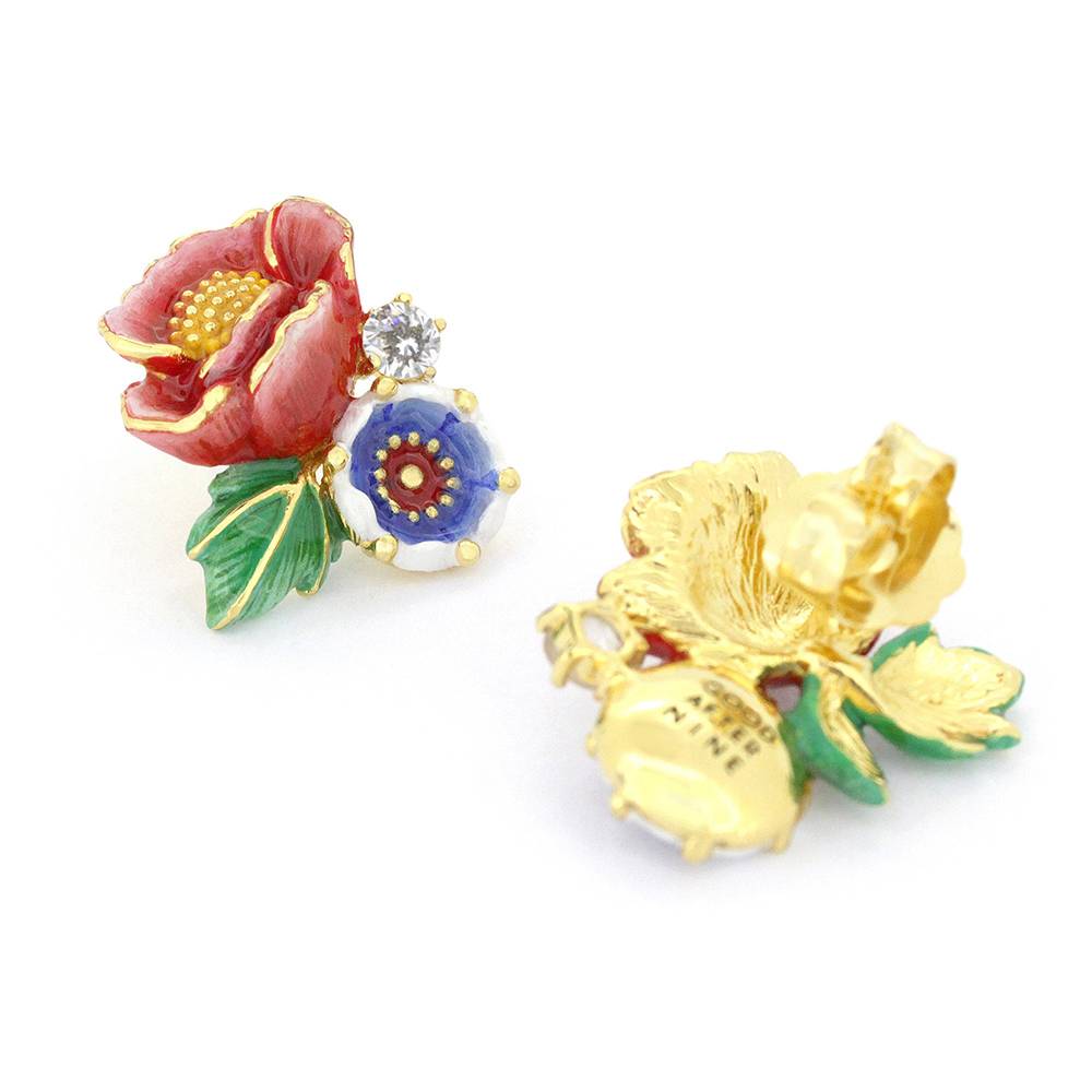 Whimsical floral earrings featuring red roses, blue accents, and sparkling stones, perfect for flower lovers.