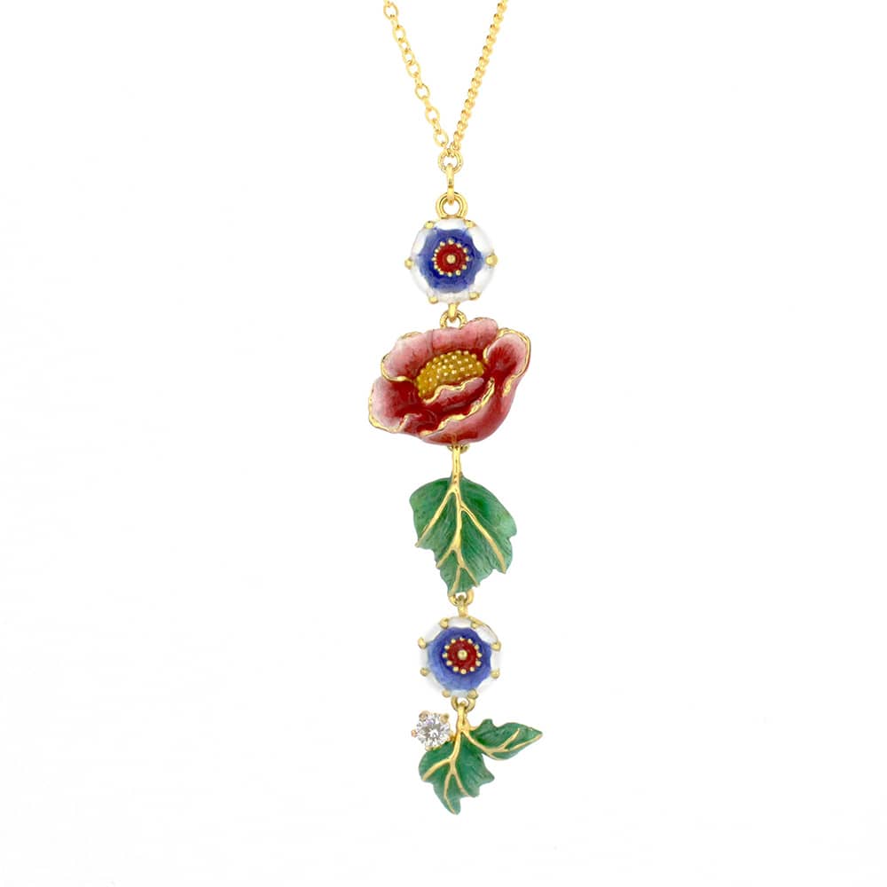 Charming necklace featuring floral and animal motifs, including a flower, blue flowers, and a tiger charm.