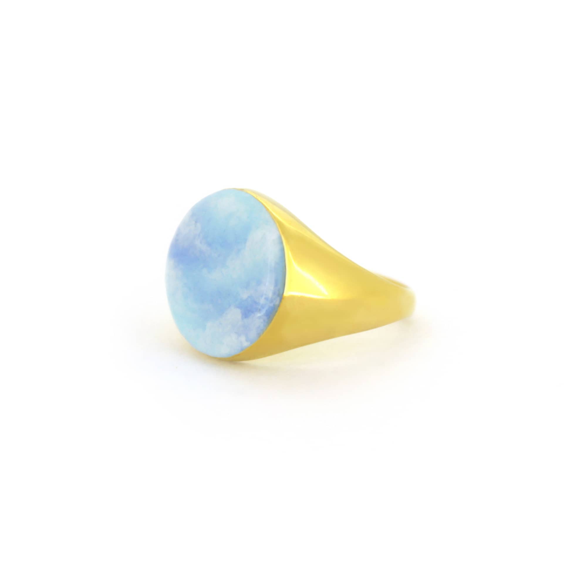 Hand-painted ring featuring a blue sky design.