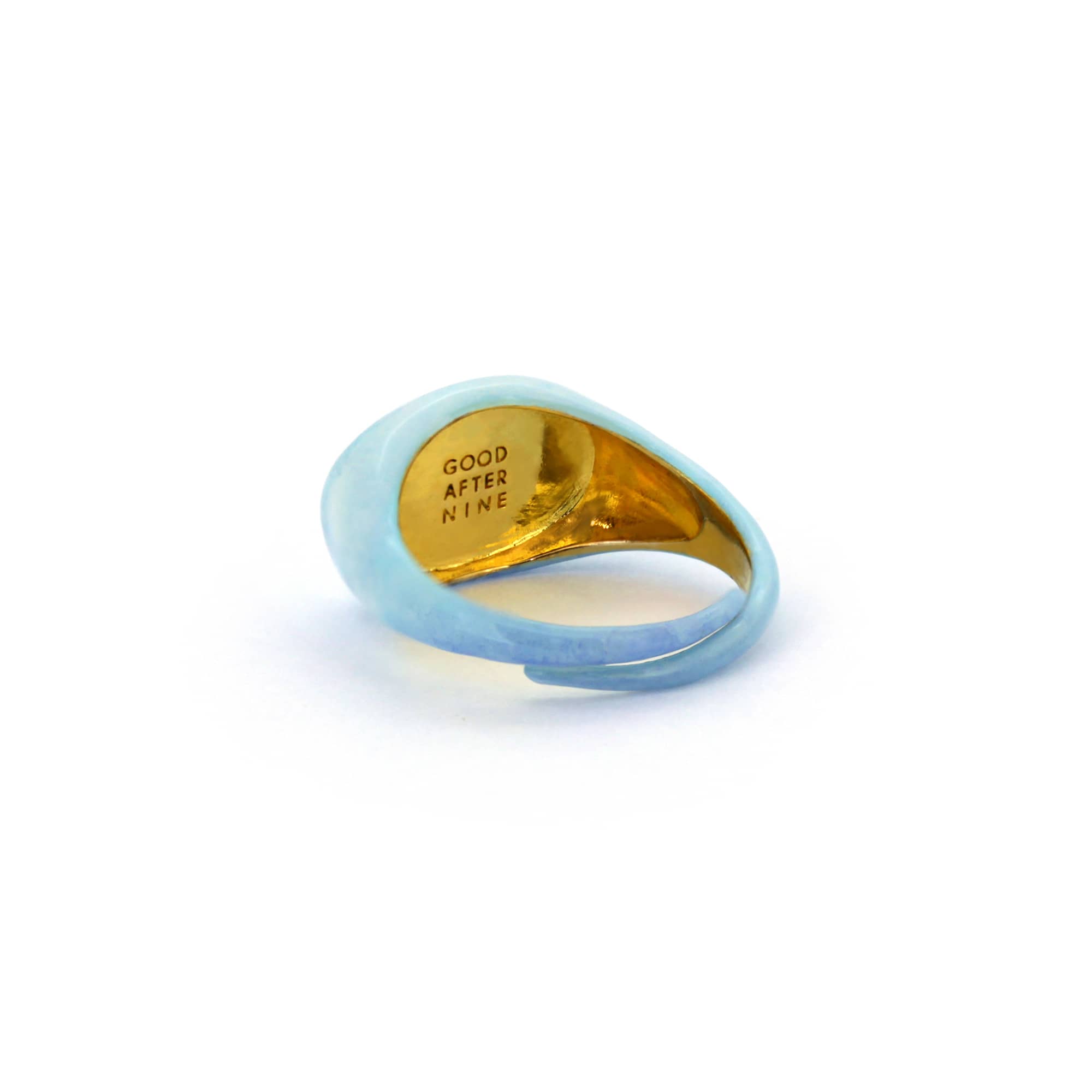 A beautiful hand-painted ring inspired by the sky with soft blue tones.