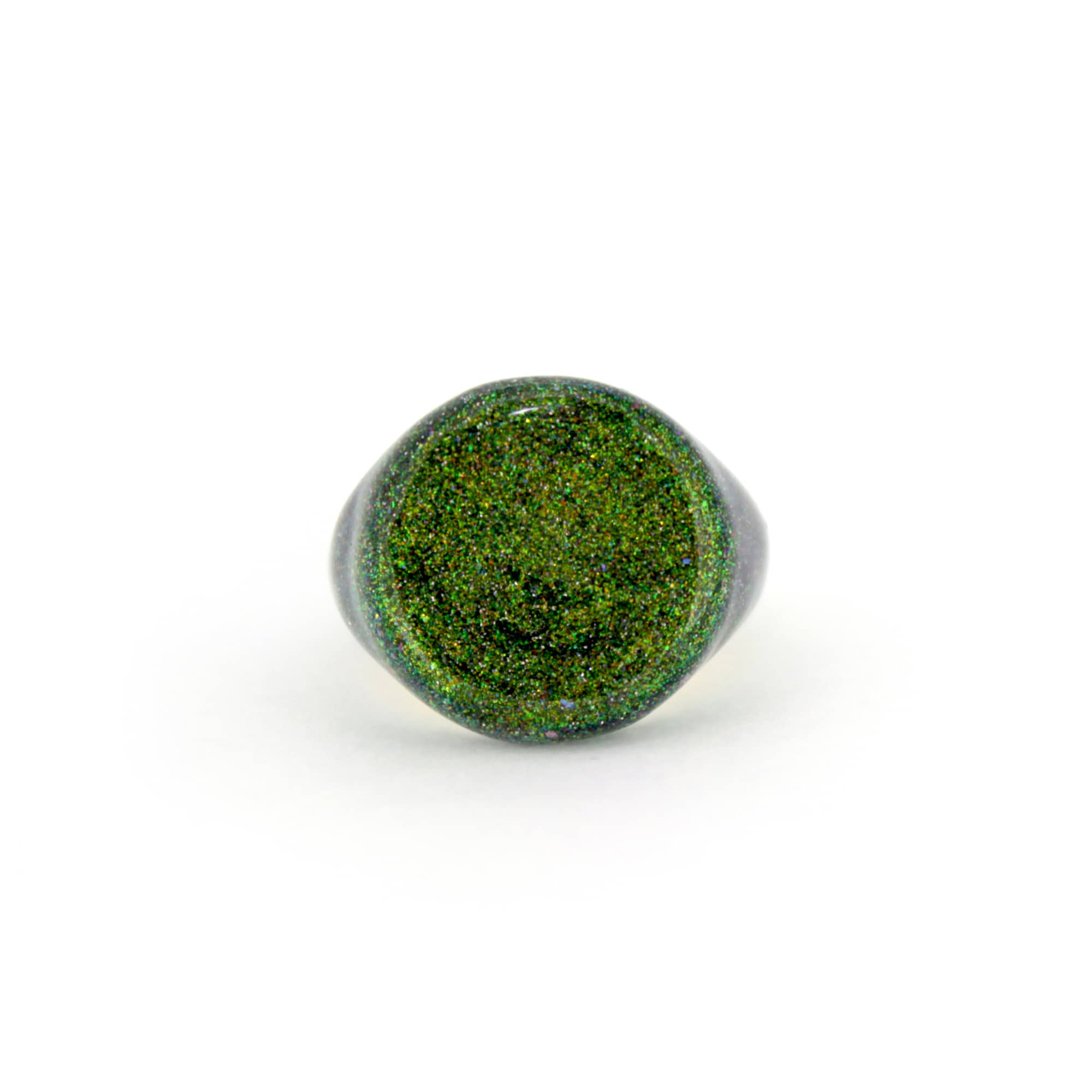 Green shimmering enamel ring inspired by the sky.