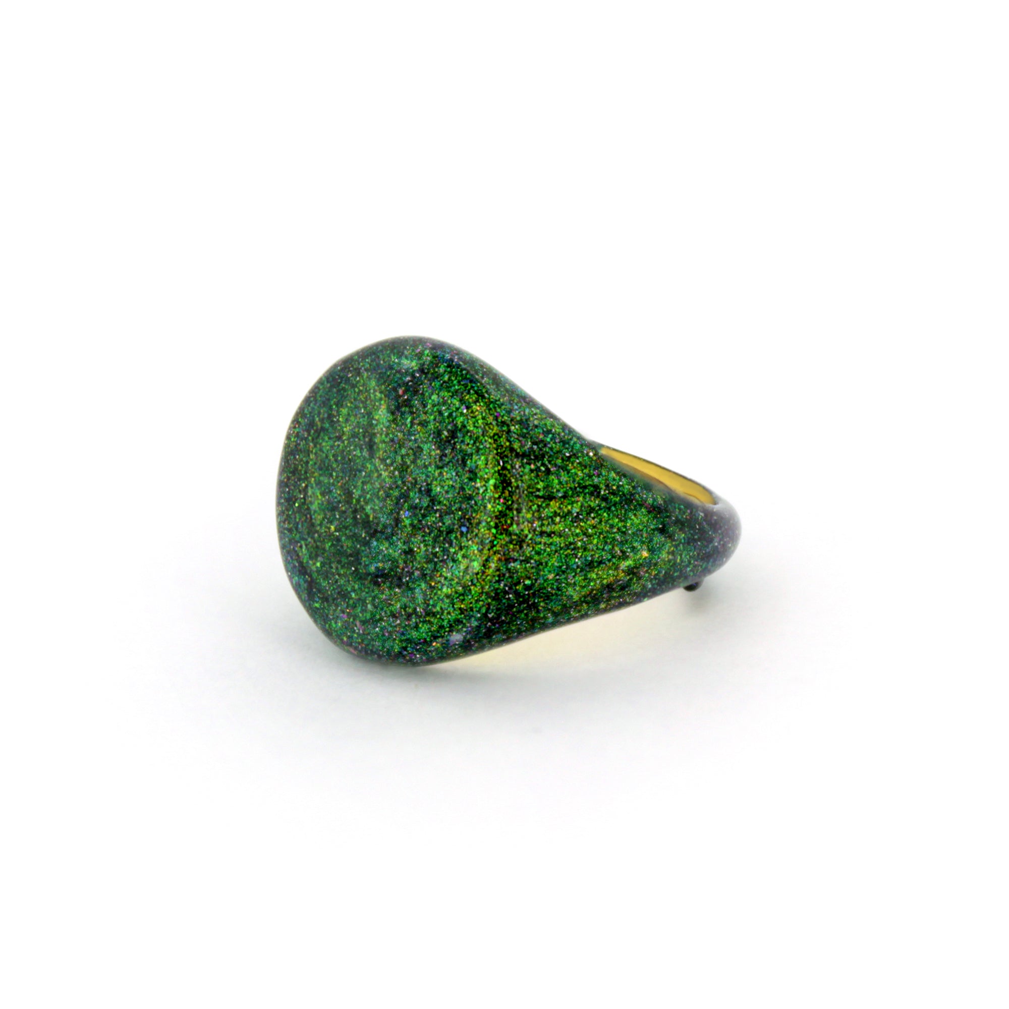 Green shimmering enamel ring inspired by the sky.