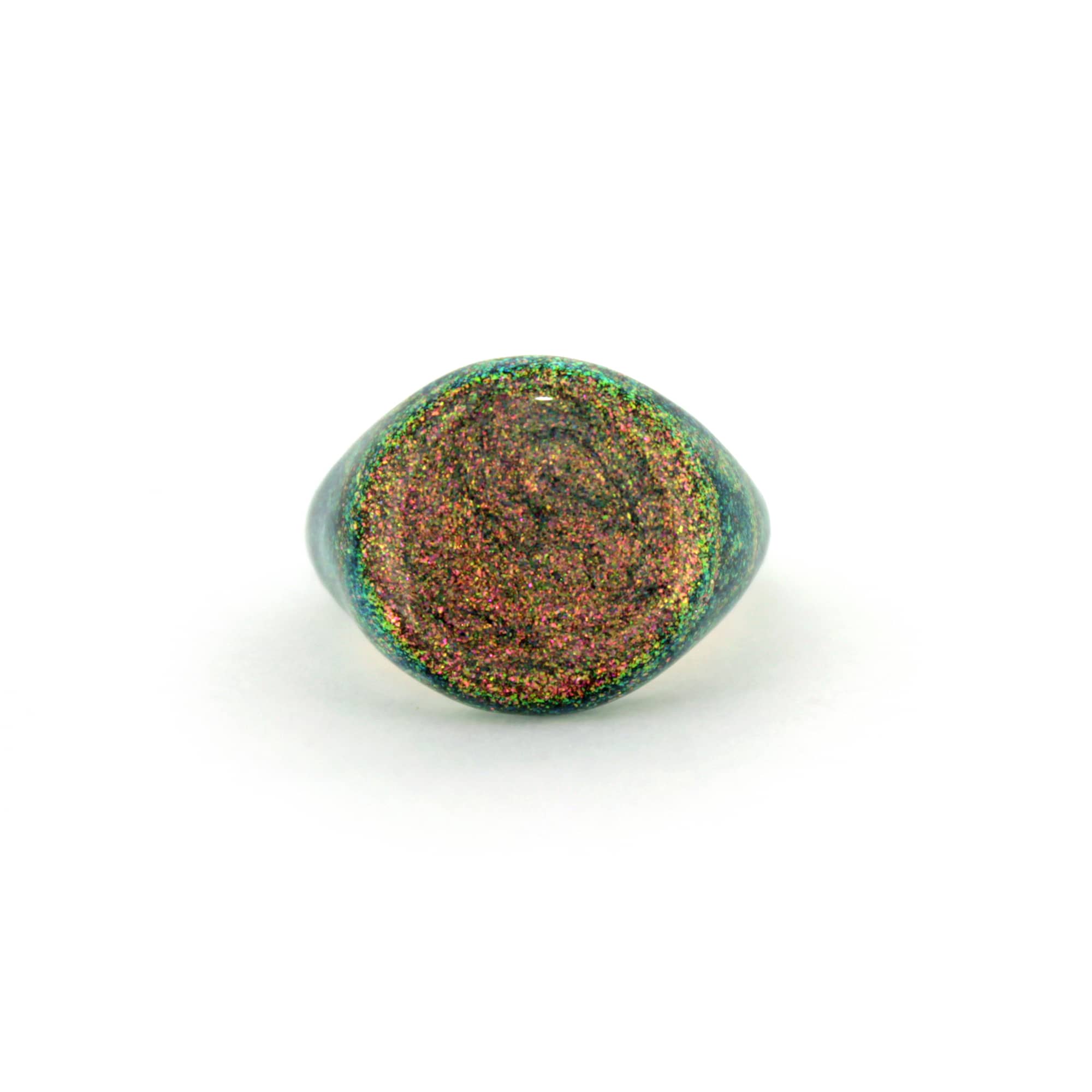 Green and orange shimmering enamel ring inspired by the sky.