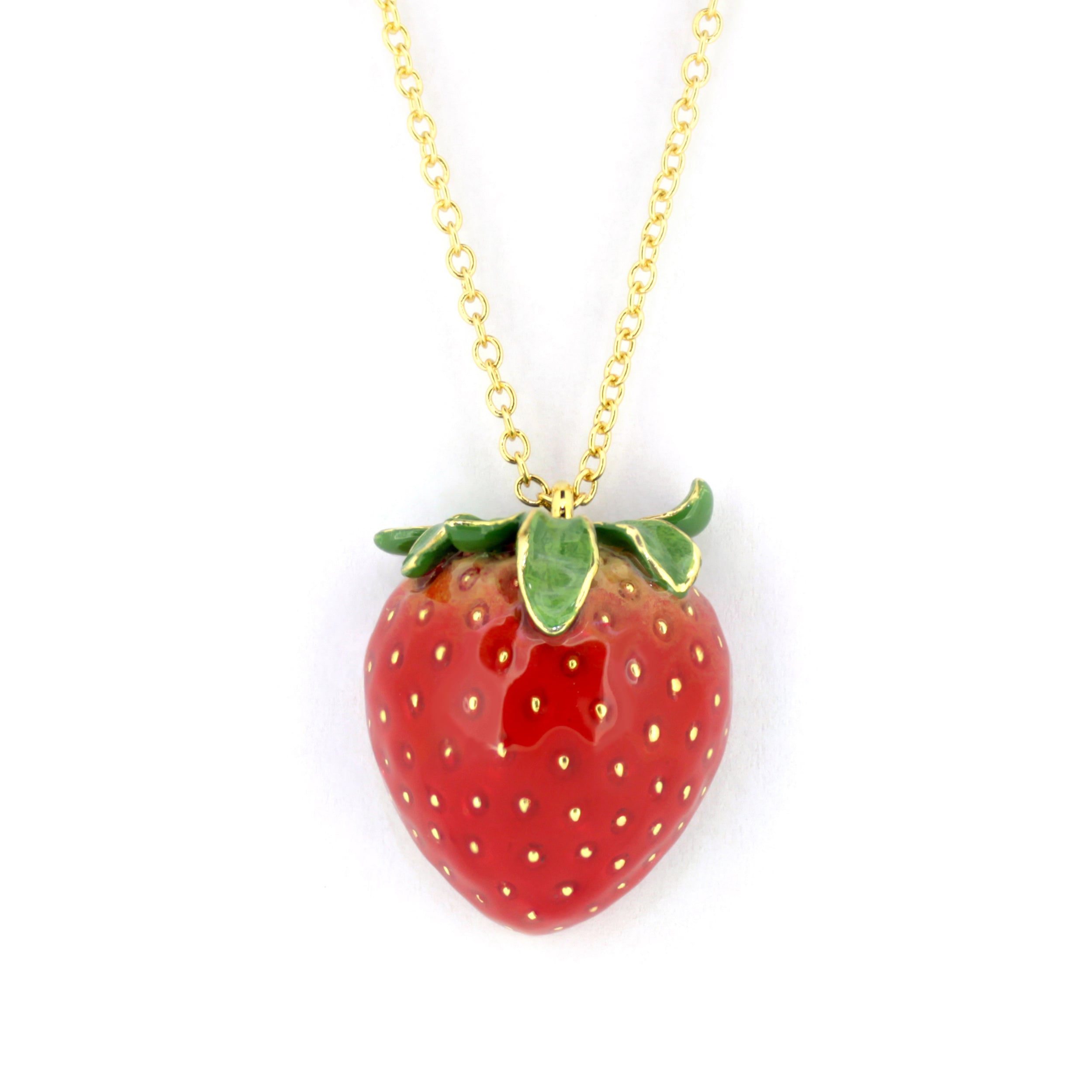 Stunning red strawberry pendant with a gold chain necklace, inspired by nature.