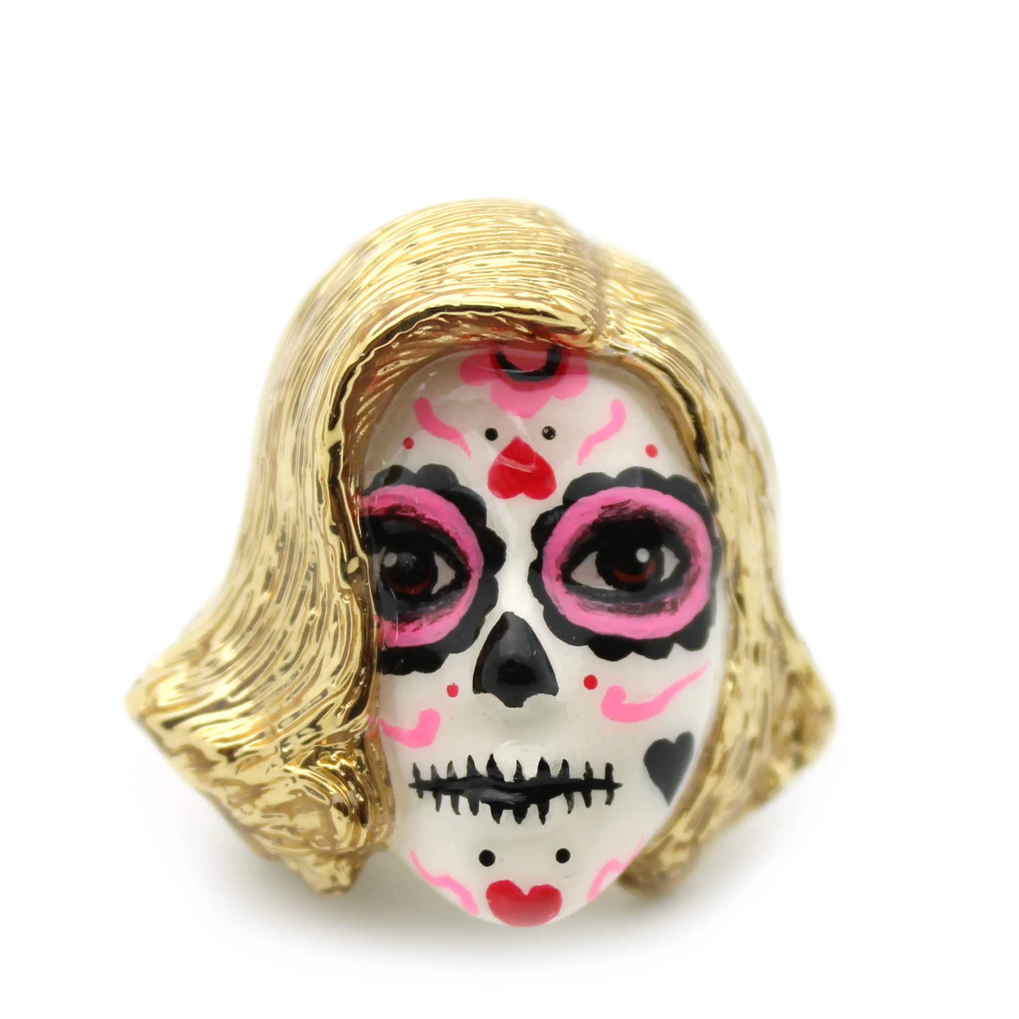 Handmade ring featuring a mask with a skull motif, a blonde wig, vibrant pink and black face paint, and heart-shaped patterns.