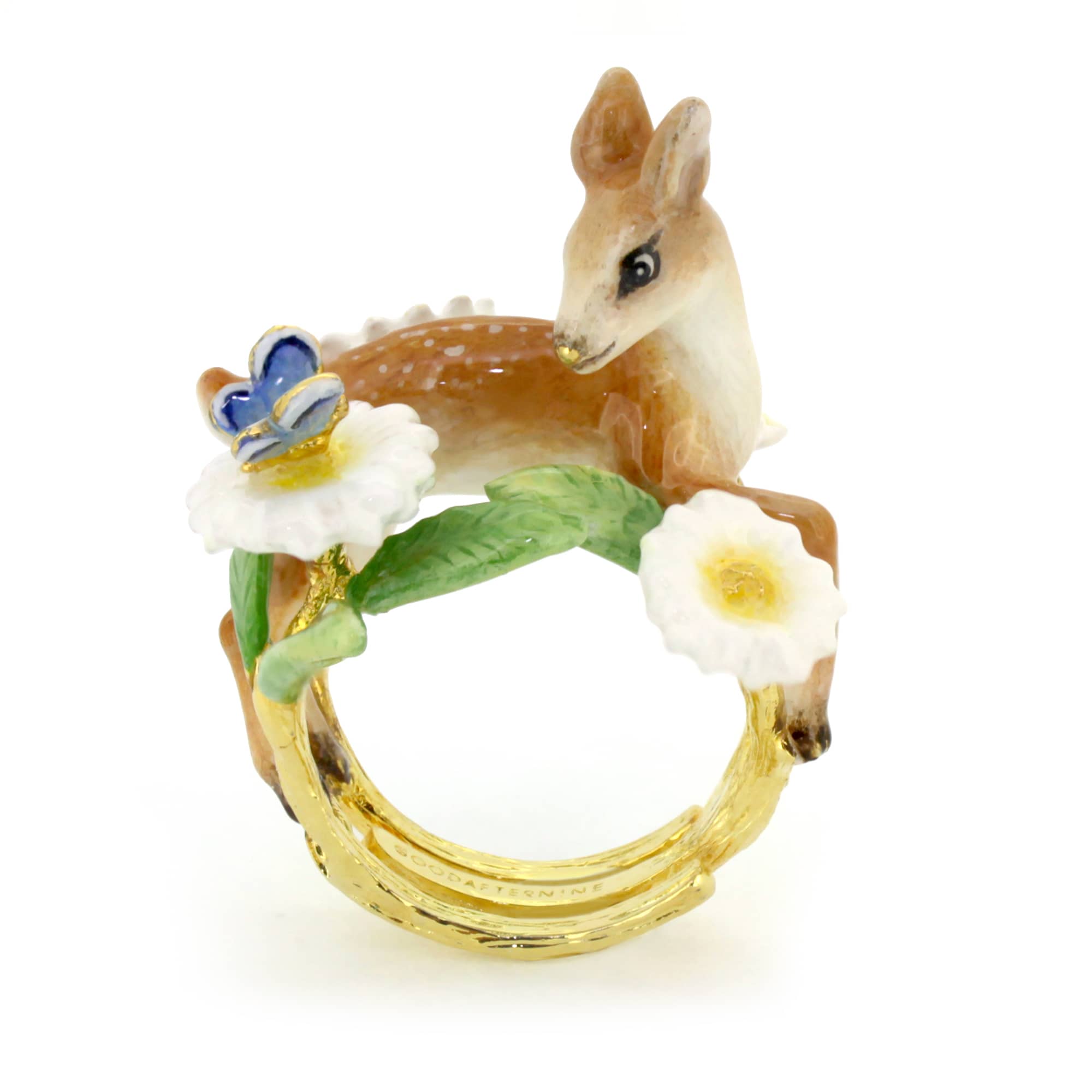 A beautifully crafted ring featuring a deer, a butterfly and floral design.