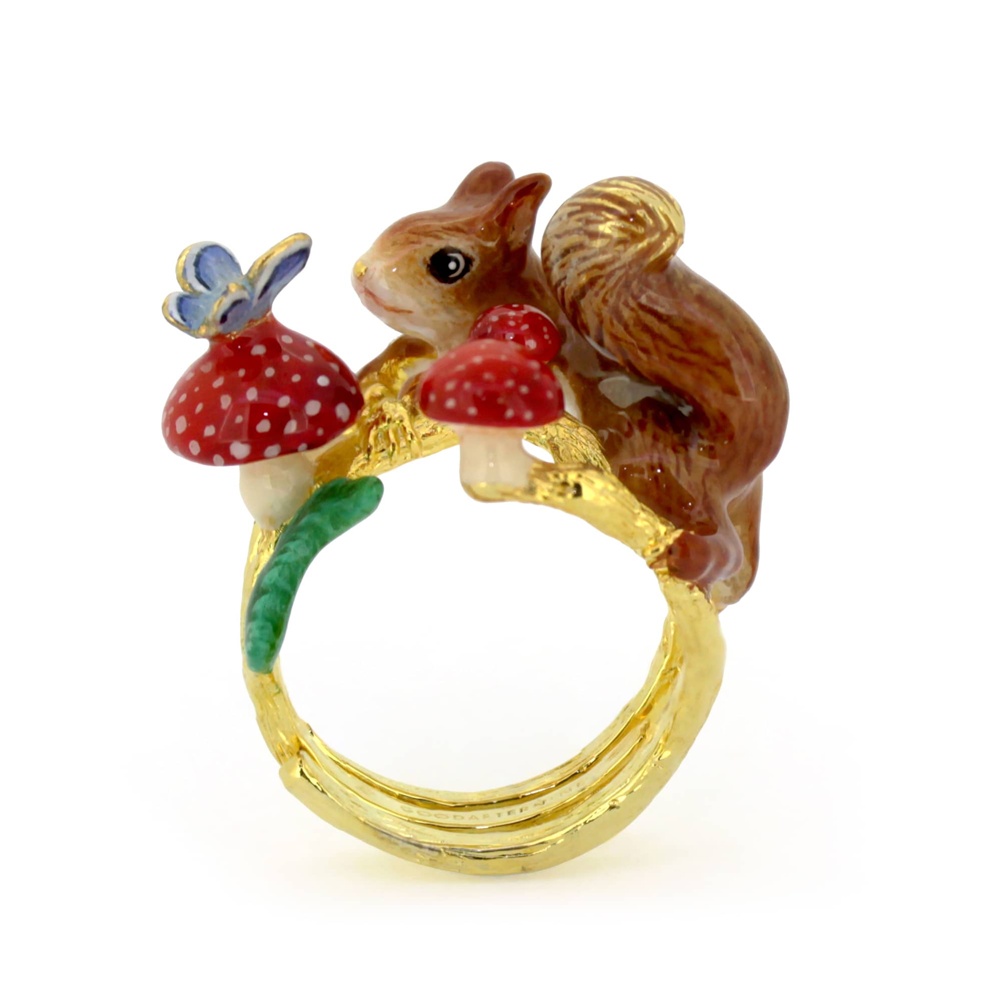 Adorable ring featuring a squirrel, red mushrooms, and a blue butterfly.