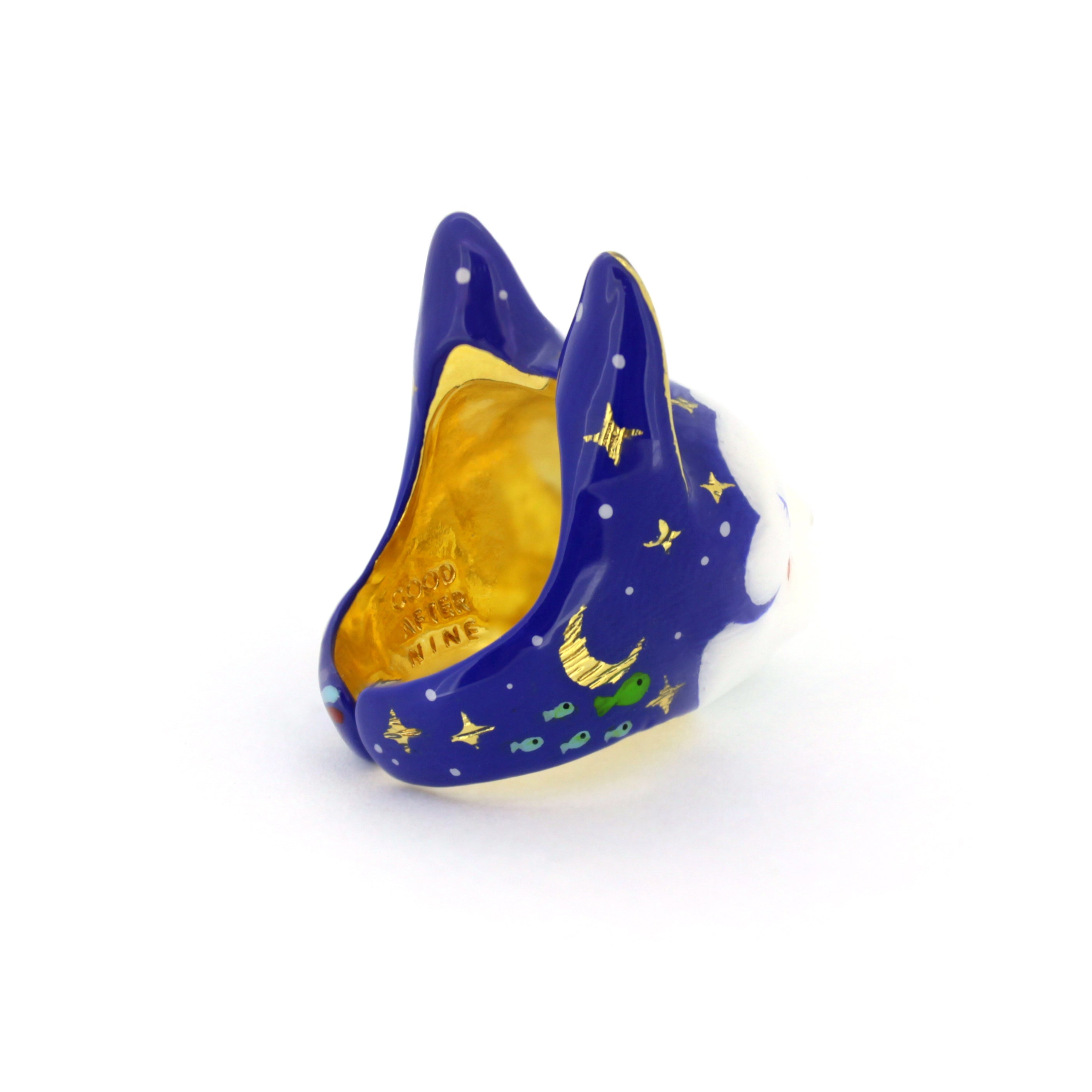 A cute sleepy cat ring with a dreamy expression and colorful design.