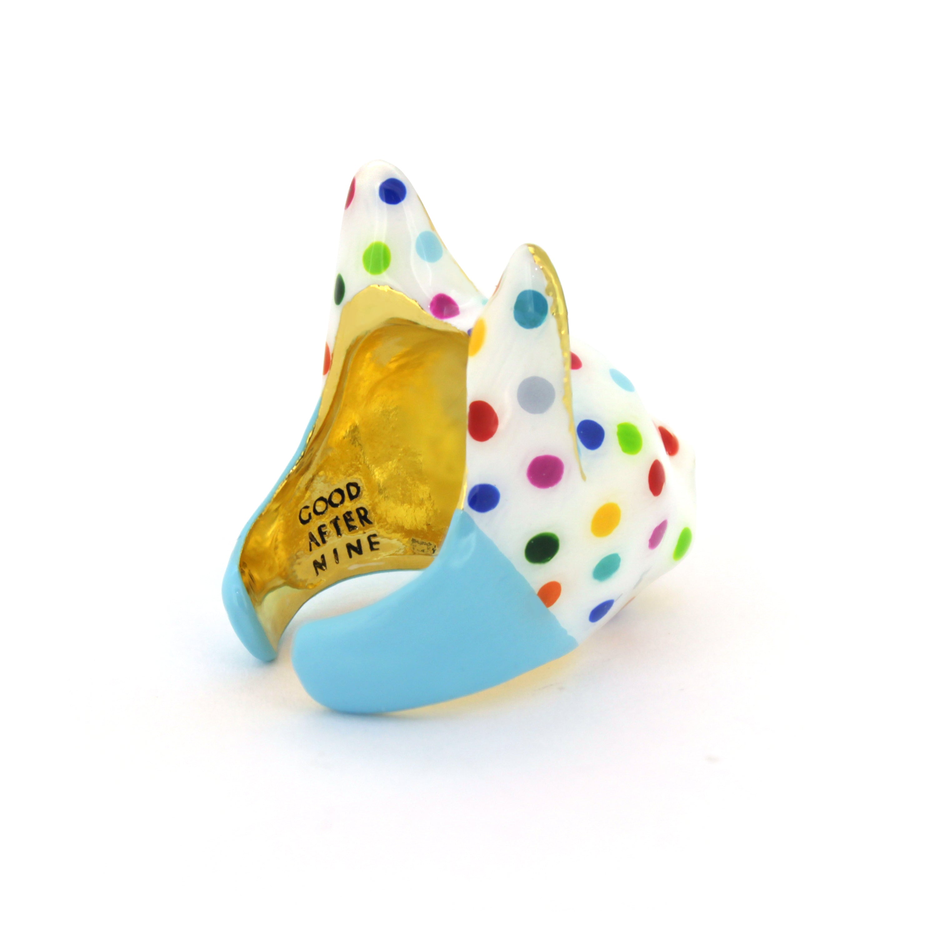 Unique cat ring with a charming design and colorful polka dots.