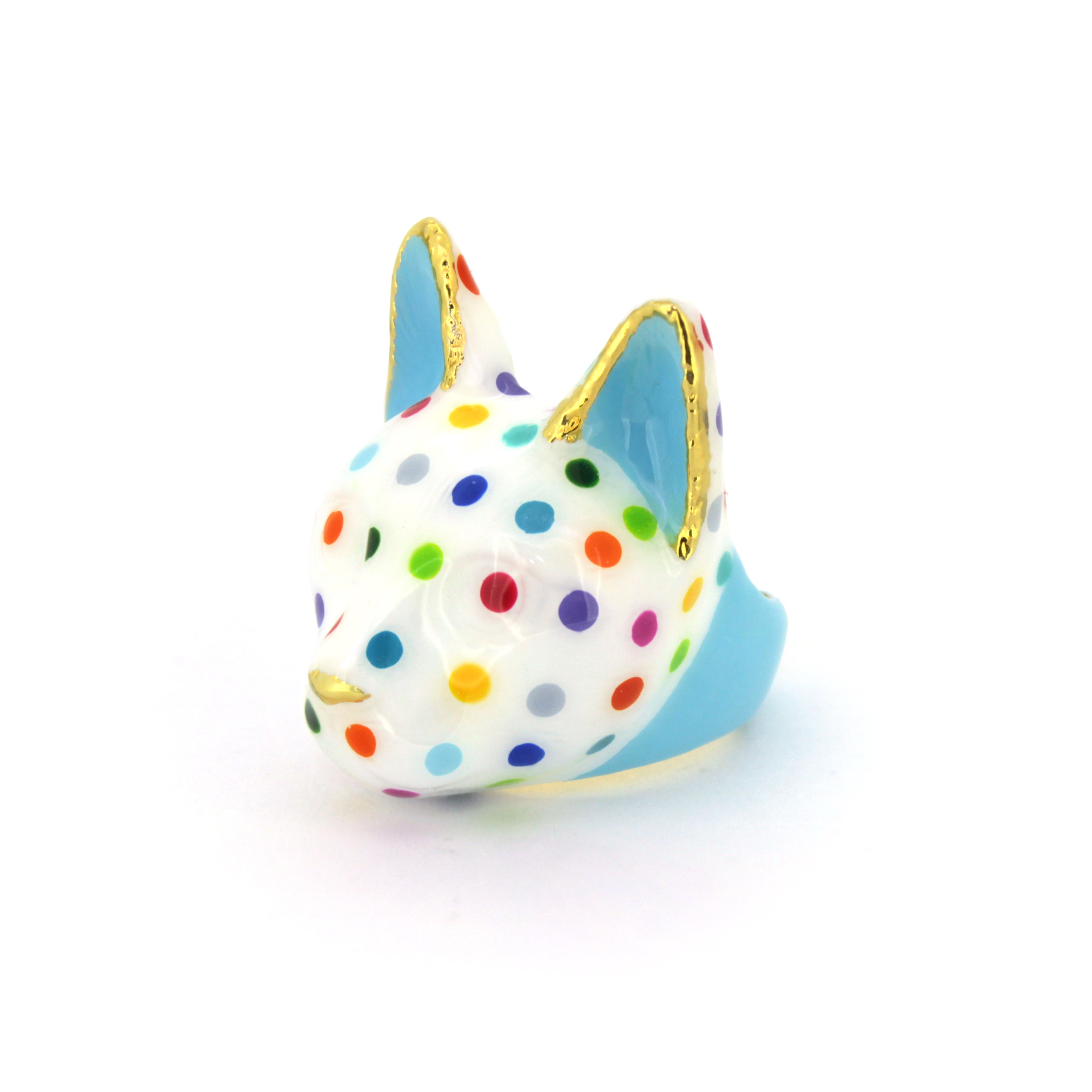 Unique cat ring with a charming design and colorful polka dots.