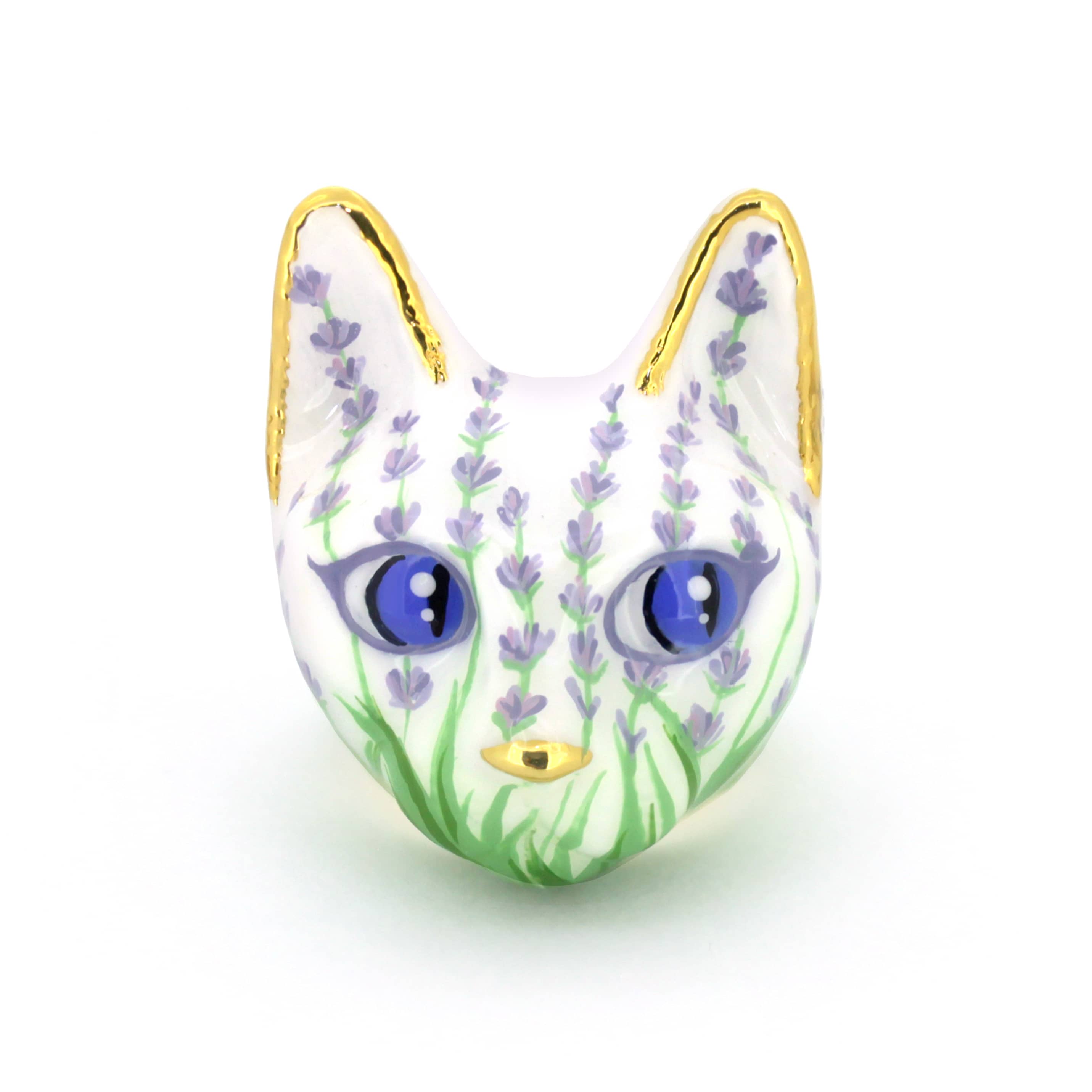 A beautiful cat ring featuring a white base, lavender flowers, and striking blue eyes, with golden detailing on ears.