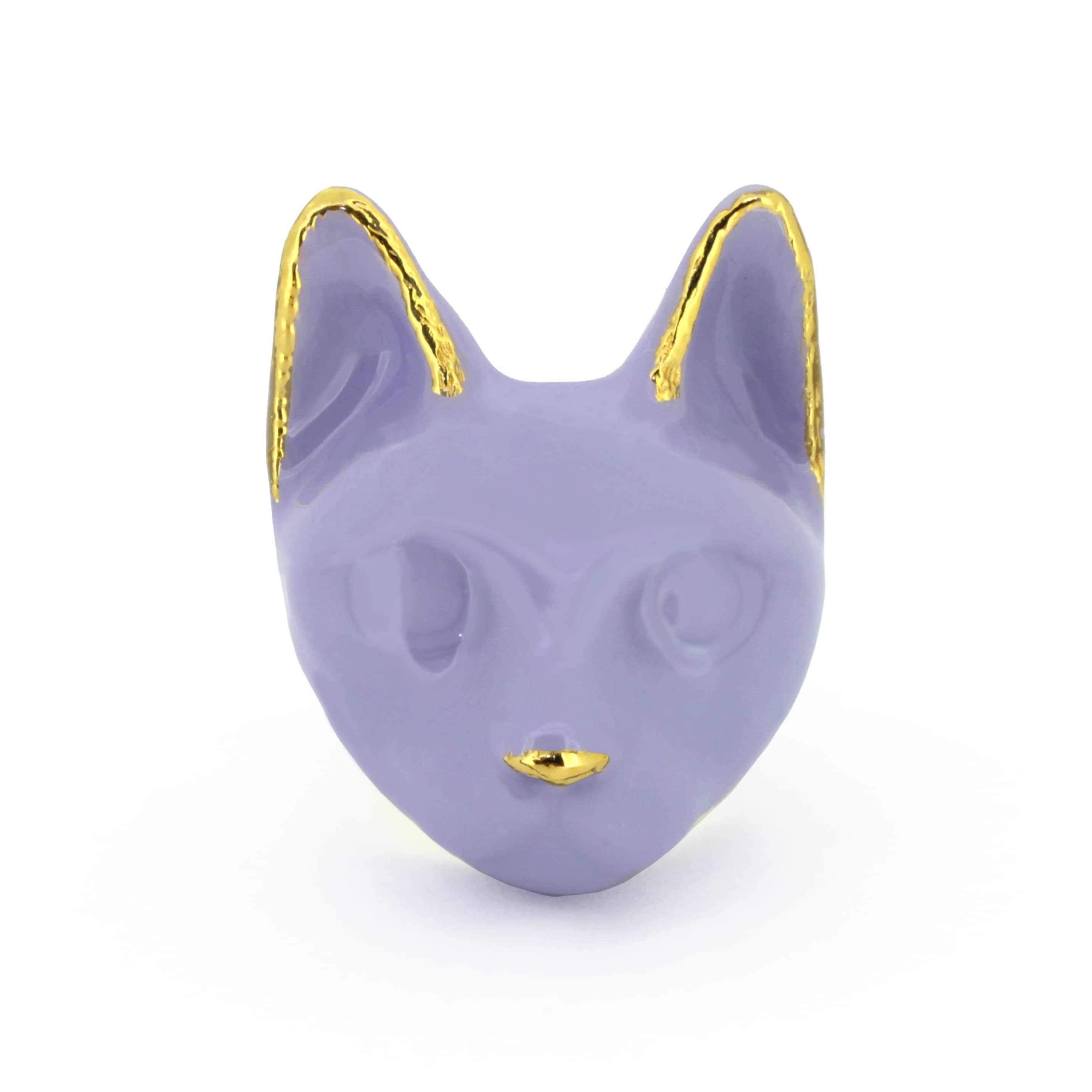 A whimsical ring designed in the shape of a cat’s head, featuring a soft lavender color.