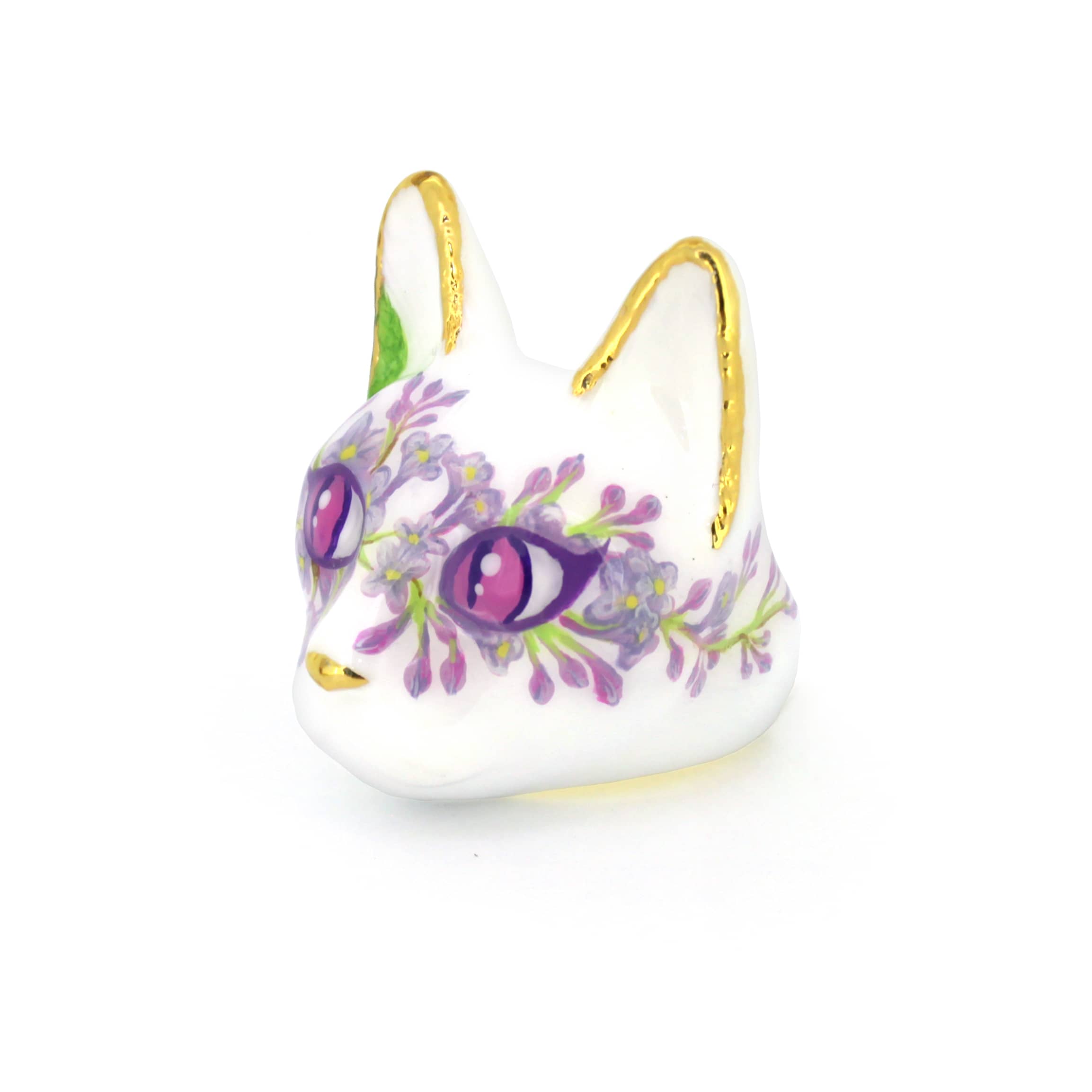 A beautiful cat head ring with purple flower designs, sparkling gold accents, and charming purple eyes.