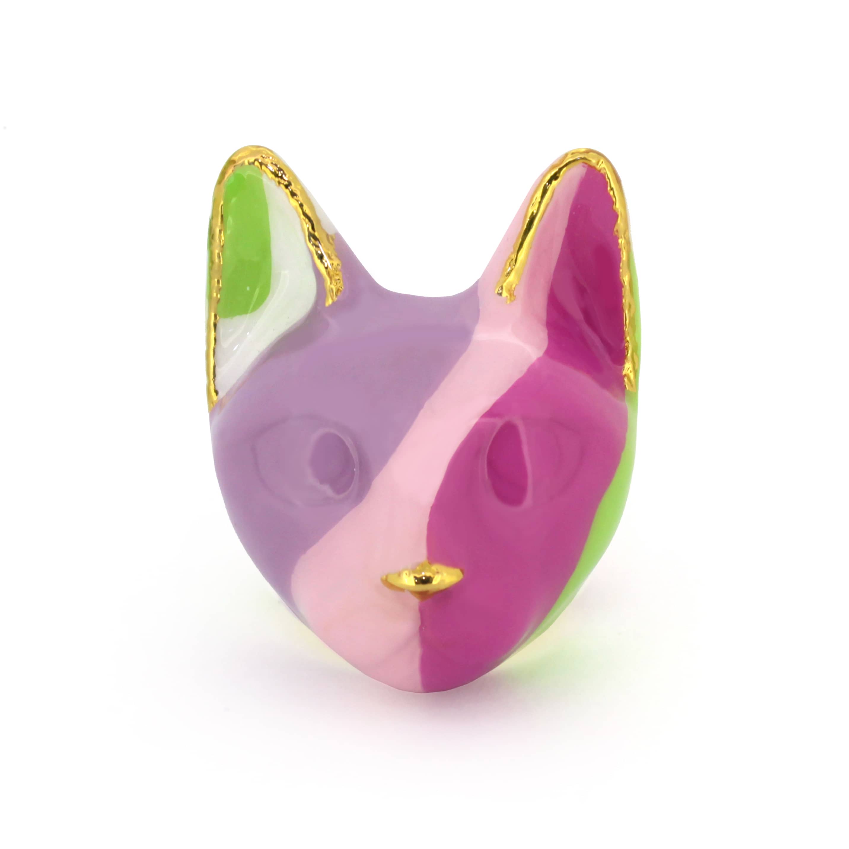 A colorful cat's head ring with geometric shapes in purple, pink, green, and white, accented by gold edges.