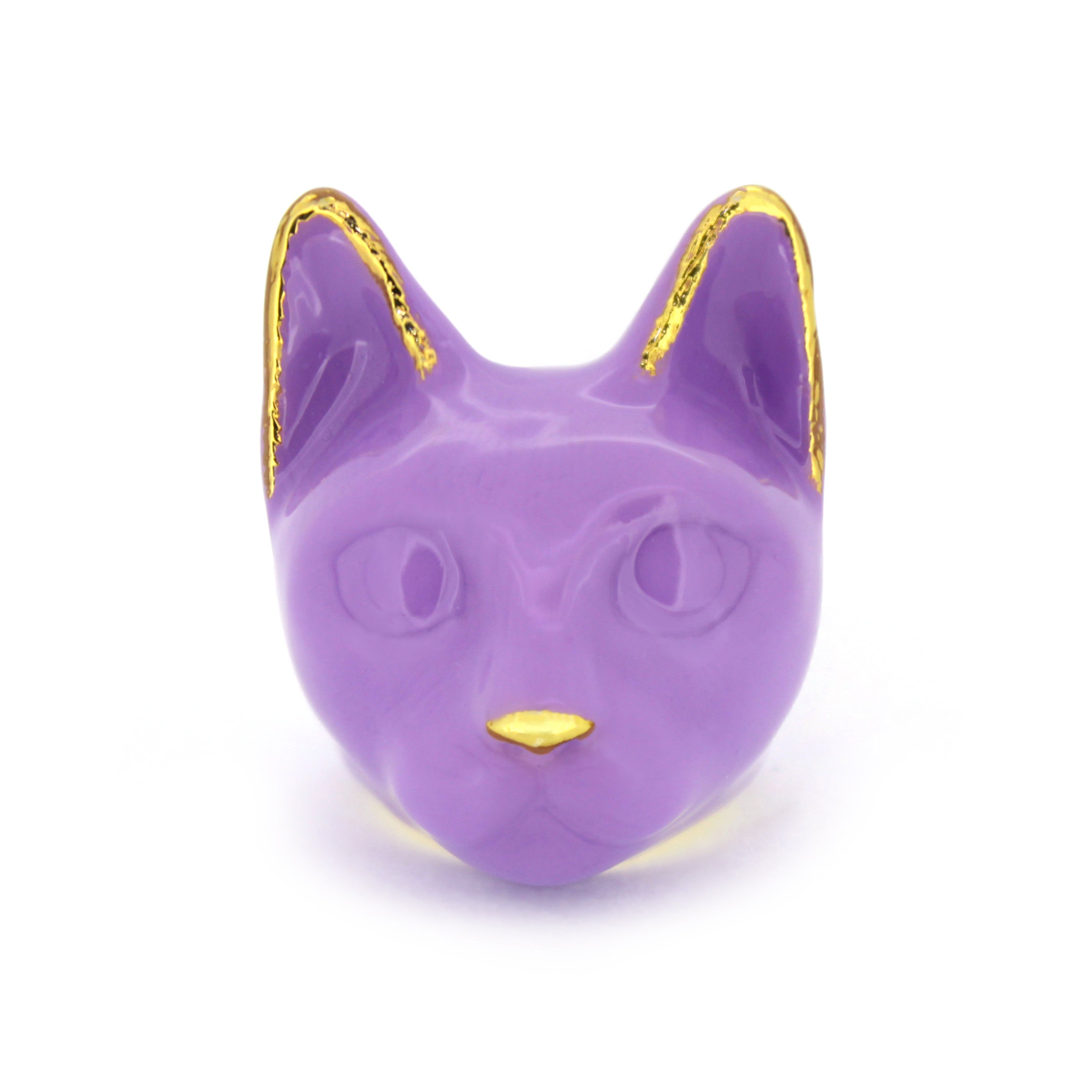 A purple cat face ring with gold accents on the ears and a small gold nose.