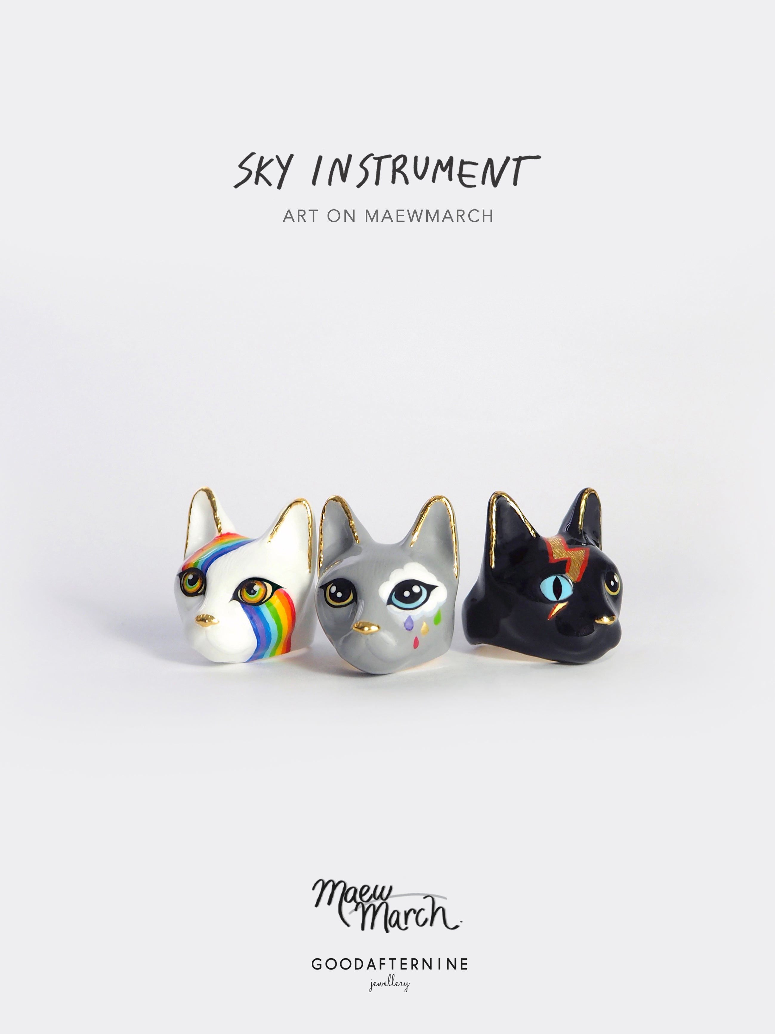 Collection of artistic cat rings with unique designs, perfect for cat lovers.