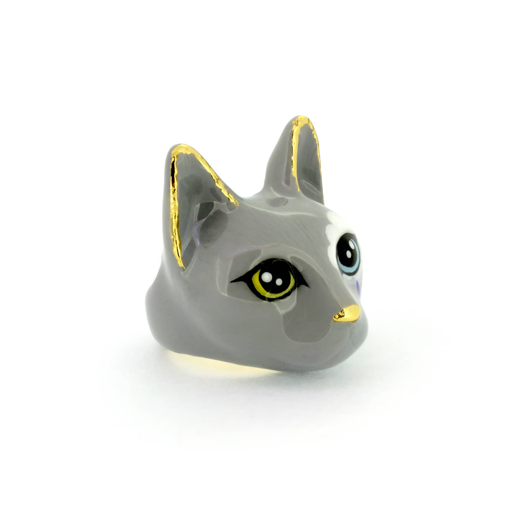 Playful cat ring in grey, with large yellow and light blue eyes and a white cloud painted on one side, with colorful raindrops