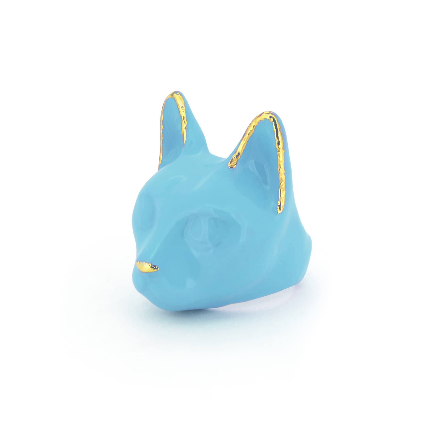 A blue cat's head ring with gold accents on the ears and a small gold nose