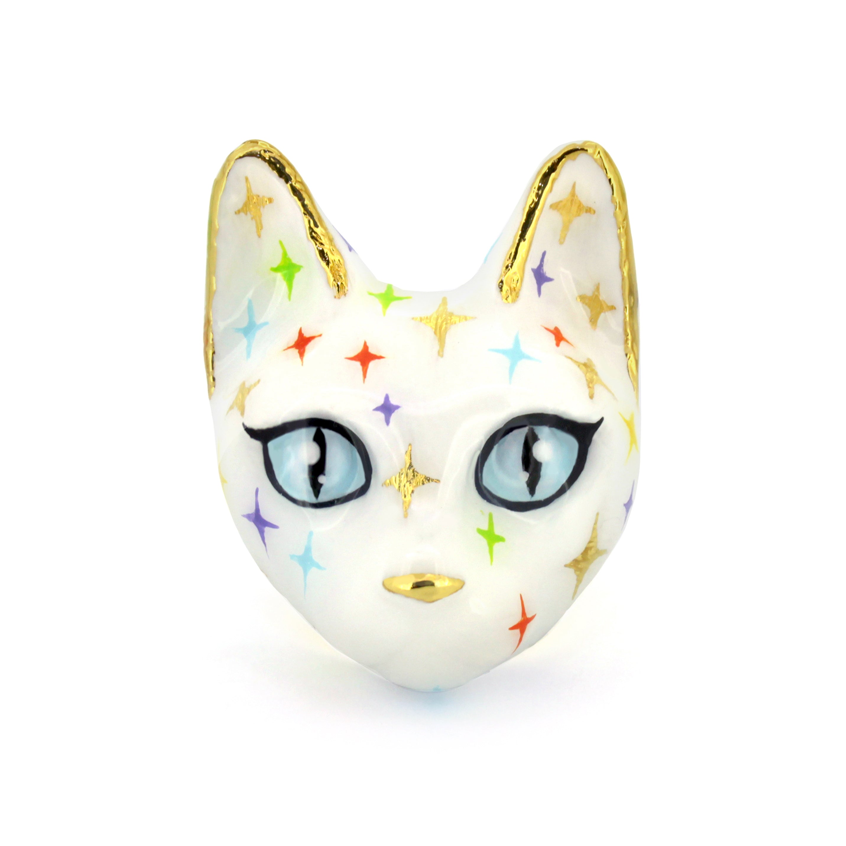 White cat head ring with blue eyes and gold accents, featuring multicolored twinkle patterns.