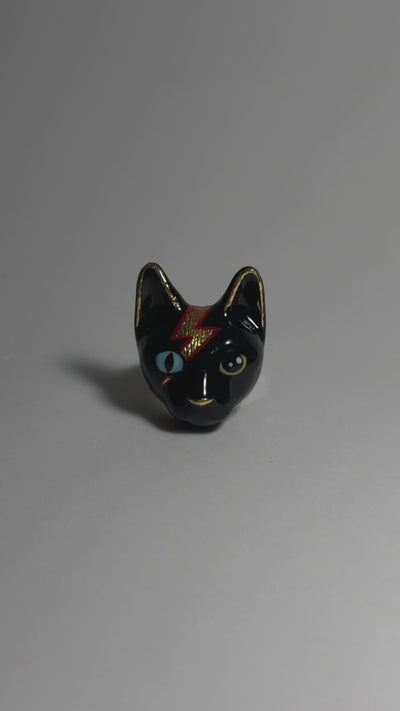 Artistic cat rings with various unique designs, perfect for cat lovers.