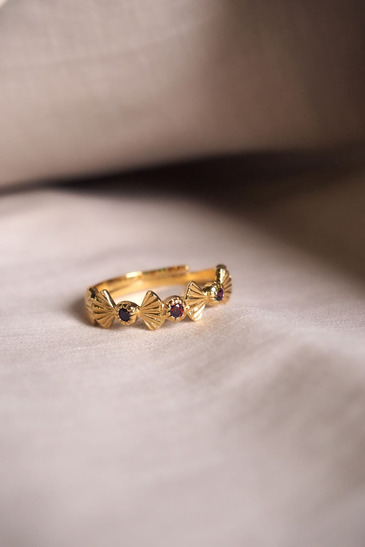 Beautifully crafted gold ring adorned with colorful stones