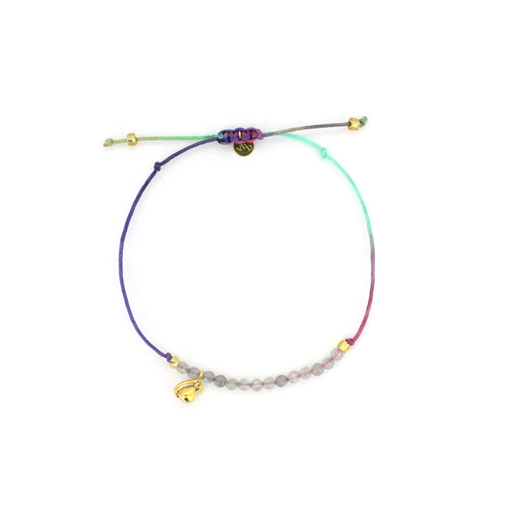 Colorful bracelet featuring Musika charm and beads.