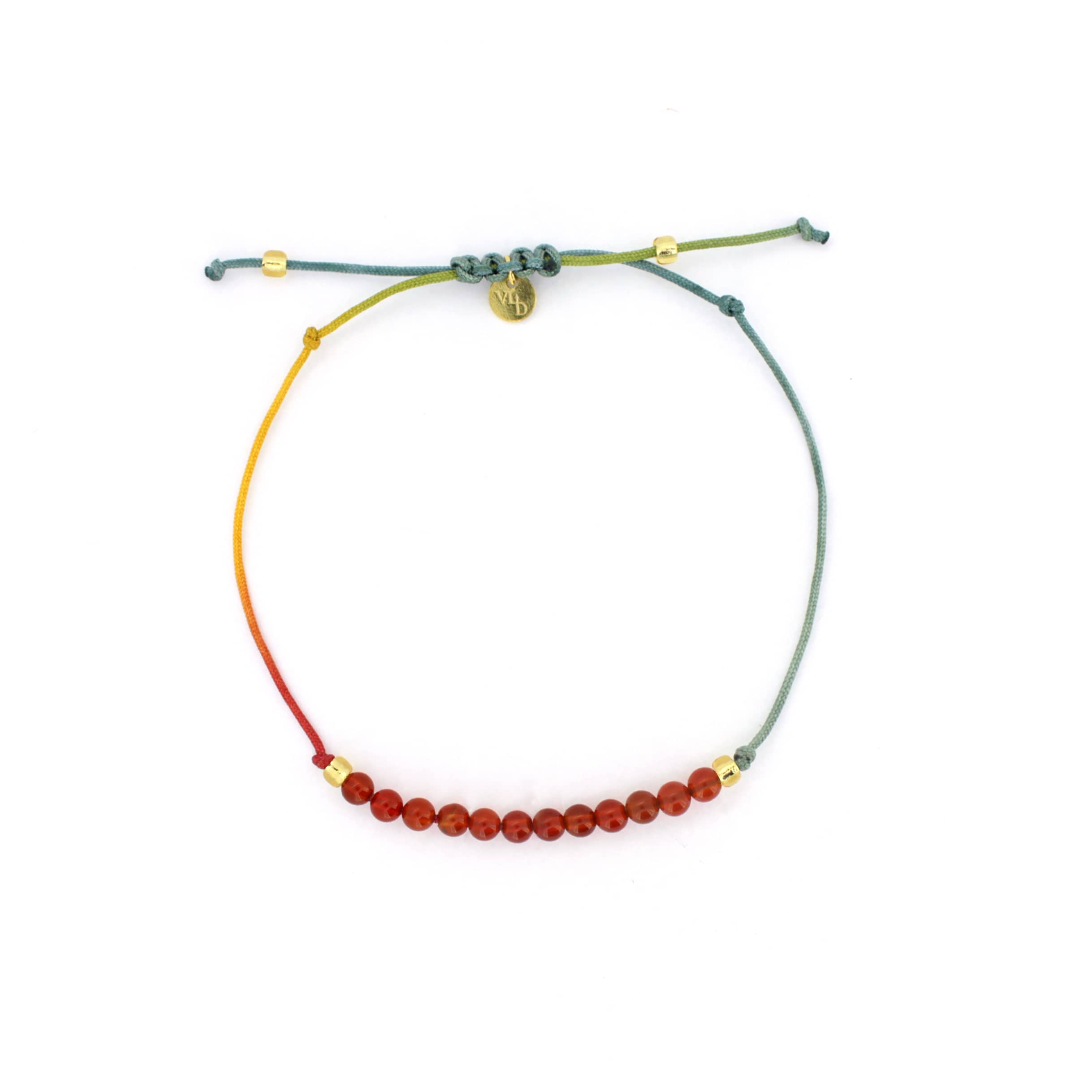 A colorful bracelet with  red agate-round beads.