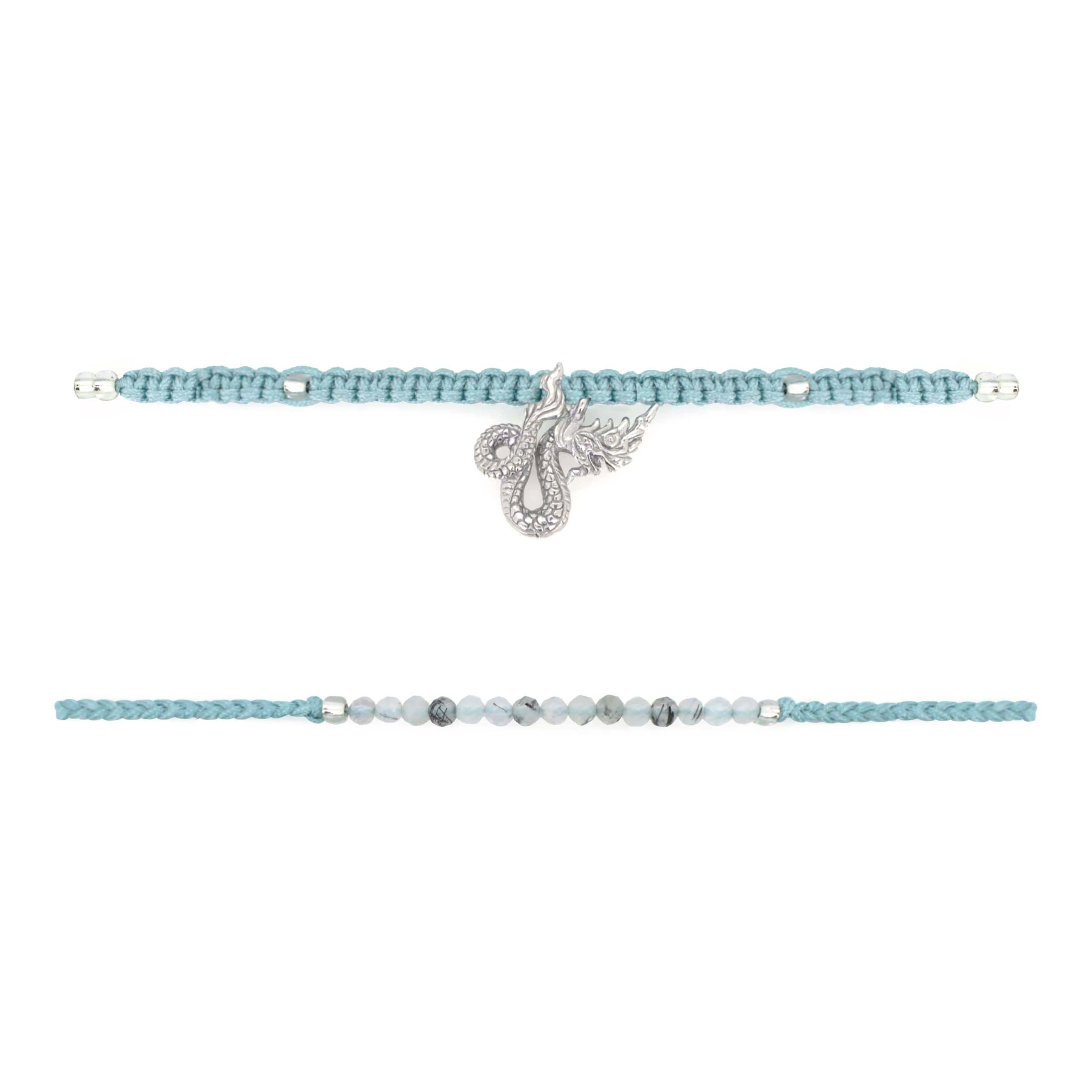 Set of two light blue bracelets: one with a silver Naga charm, the other with grey quartz-faced beads.