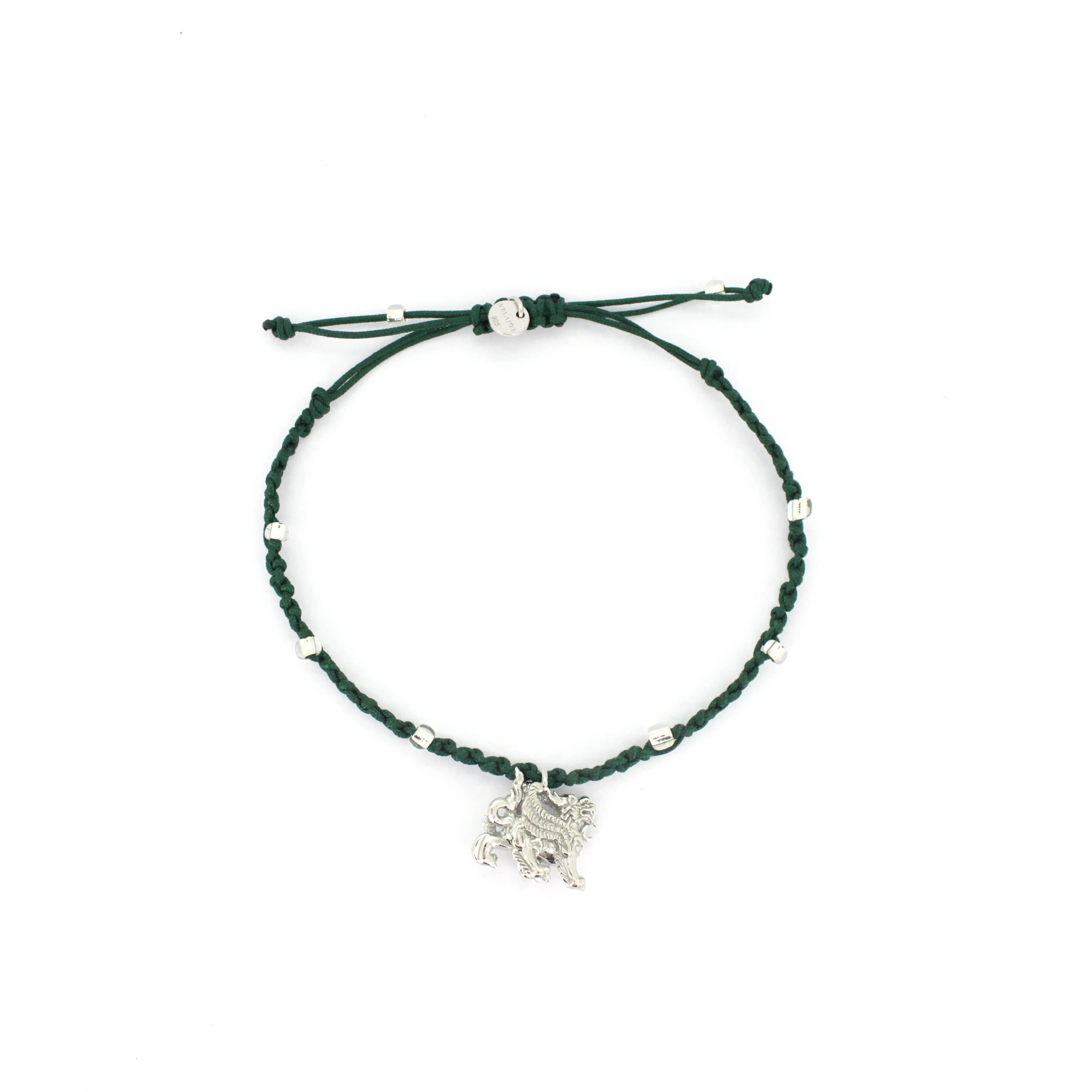 A green bracelet with a silver Pixiu charm