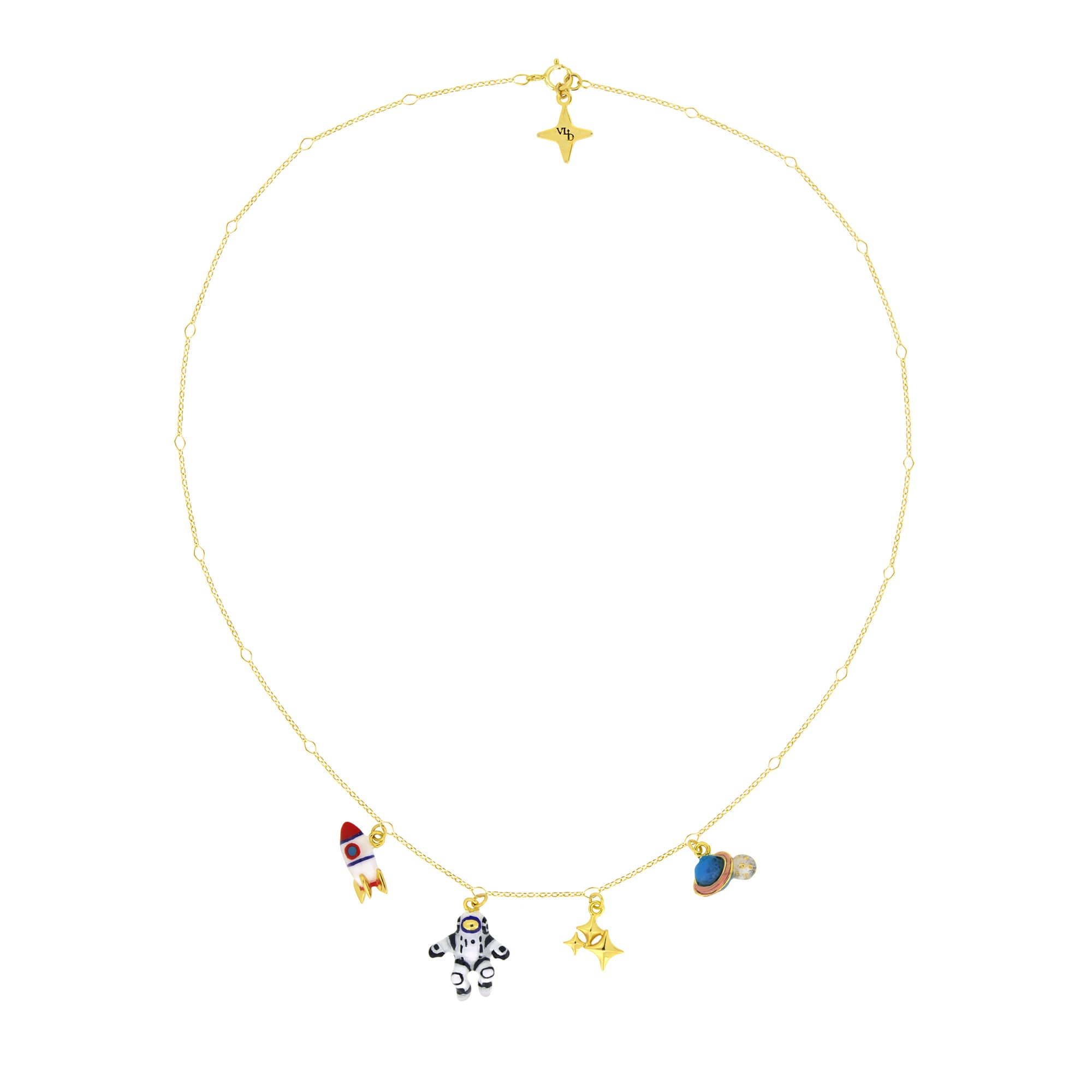 A unqiue gold necklace with a rocket, astronaut, stars, and Saturn charms.