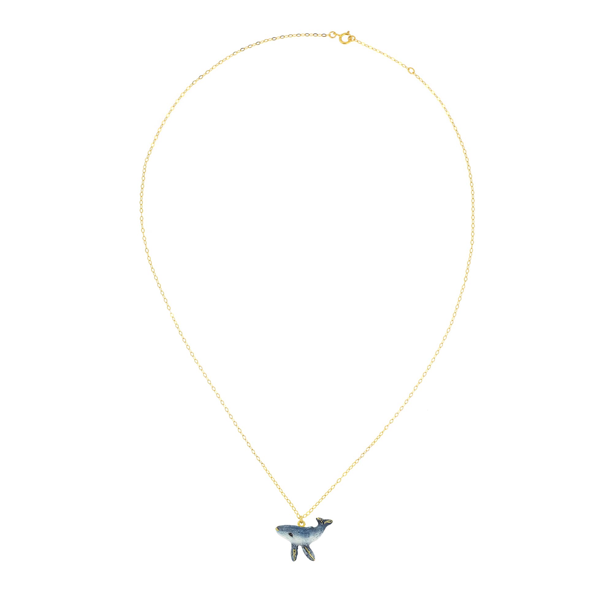 Beautiful gold chain necklace featuring a whale charm