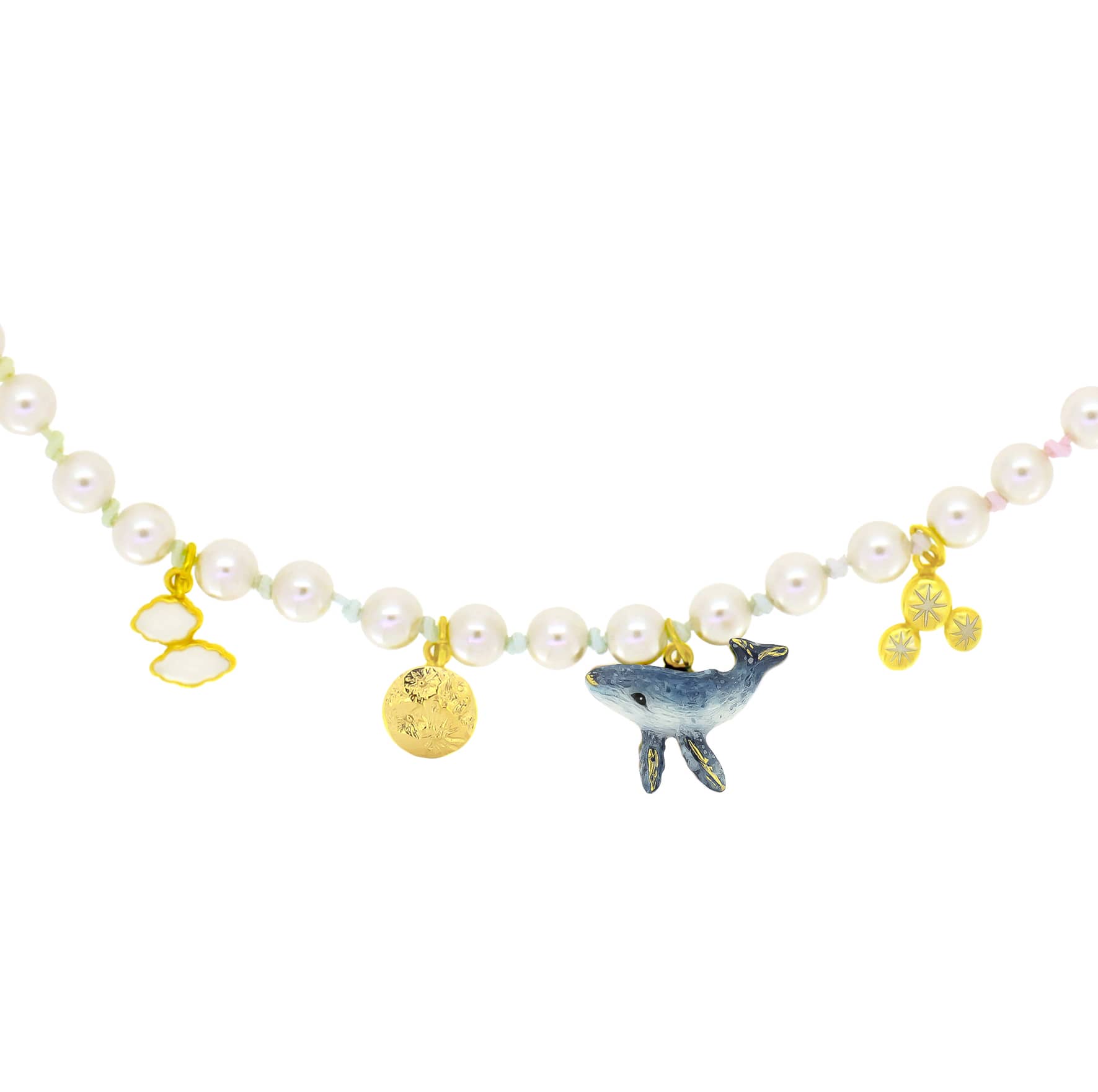 Artisan-crafted pearl choker with whimsical gold charms including a whale, a moon, clouds, and stars.