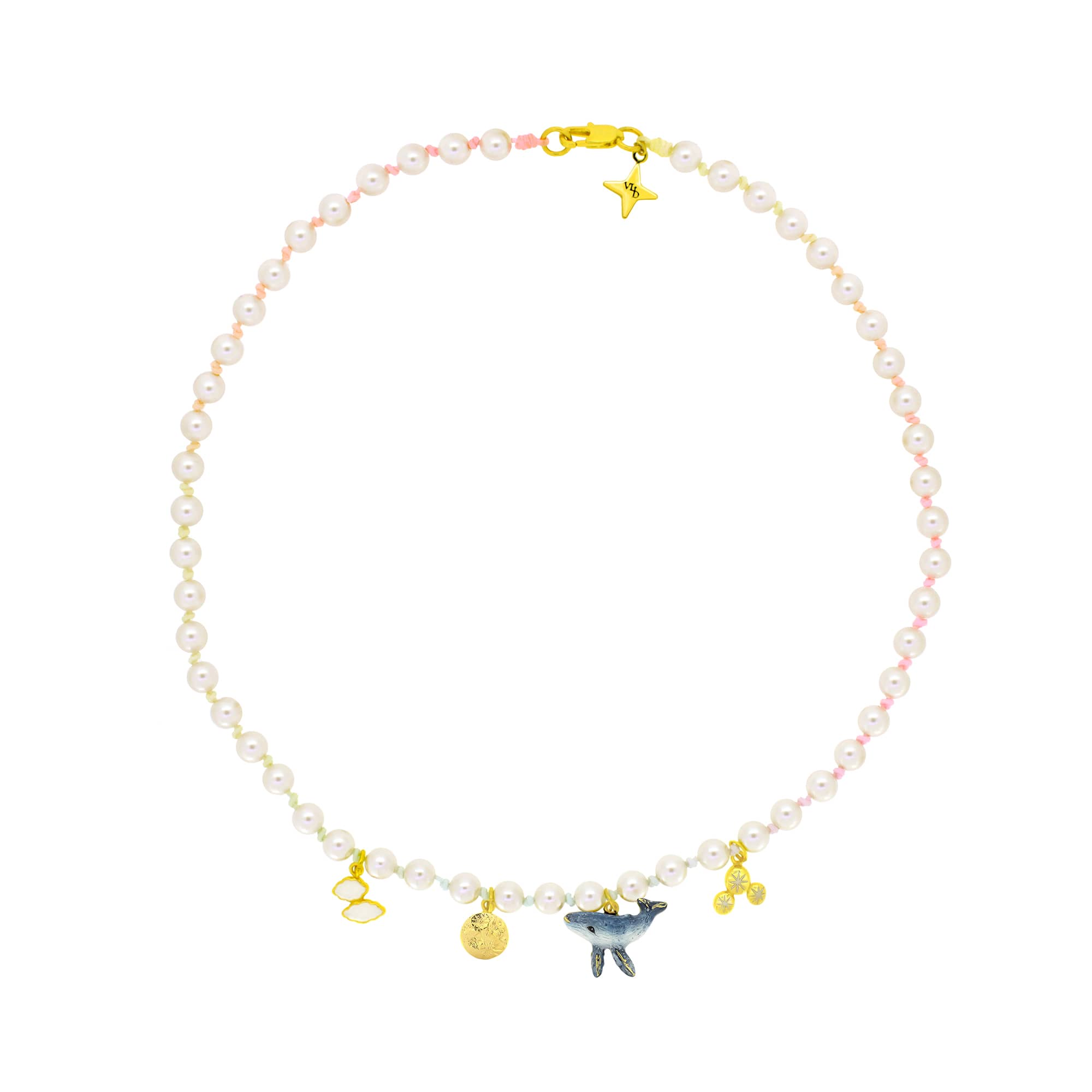 Artisan-crafted pearl choker with whimsical gold charms including a whale, a moon, clouds, and stars.