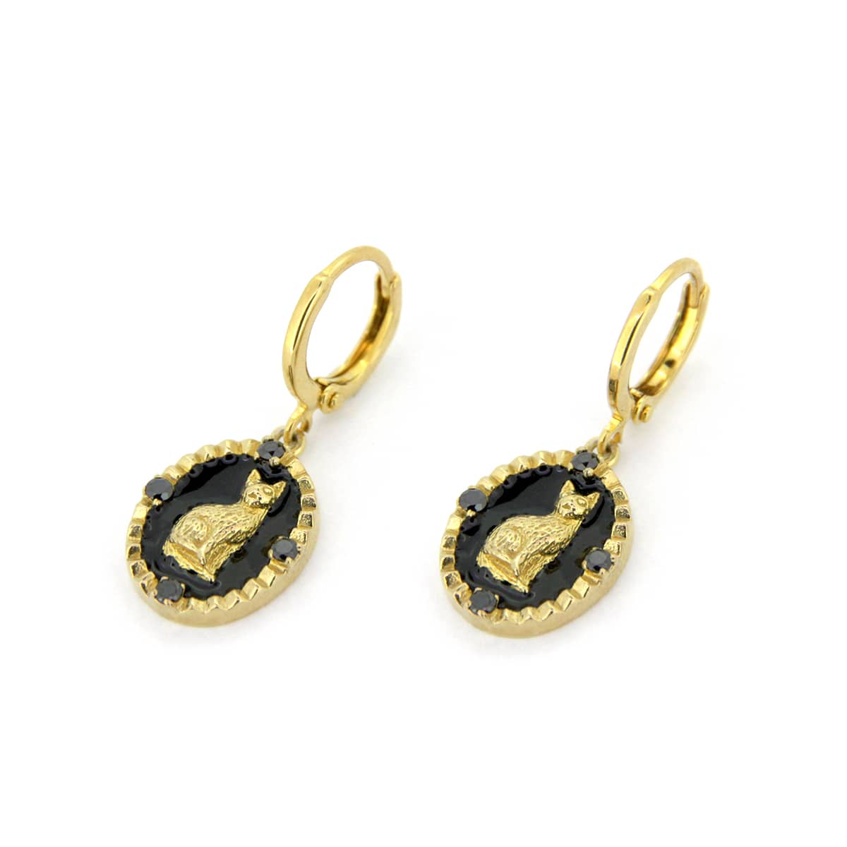 Unique cat earrings on a black oval background with decorative elements.