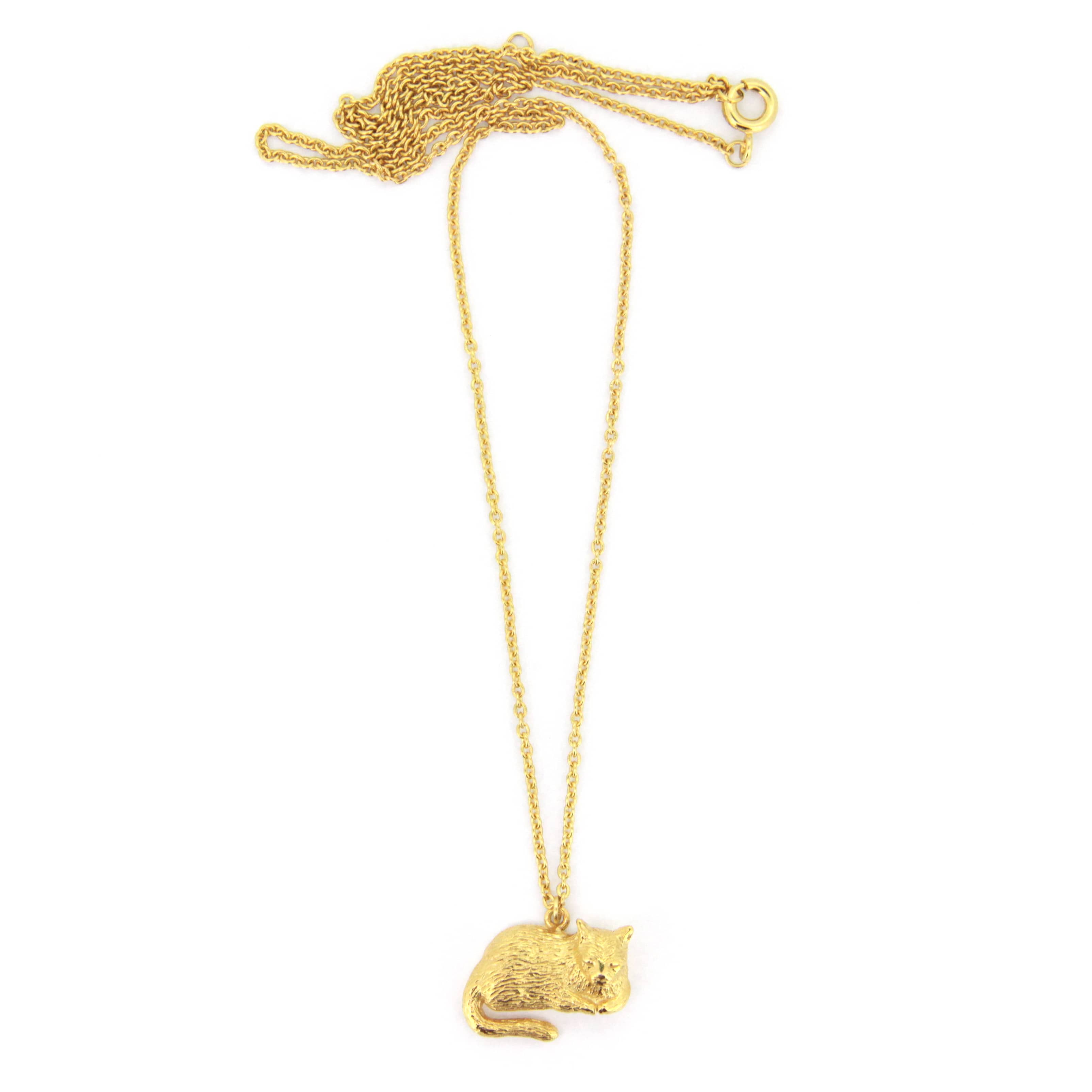 Charming gold pendant necklace featuring a sleeping cat design.