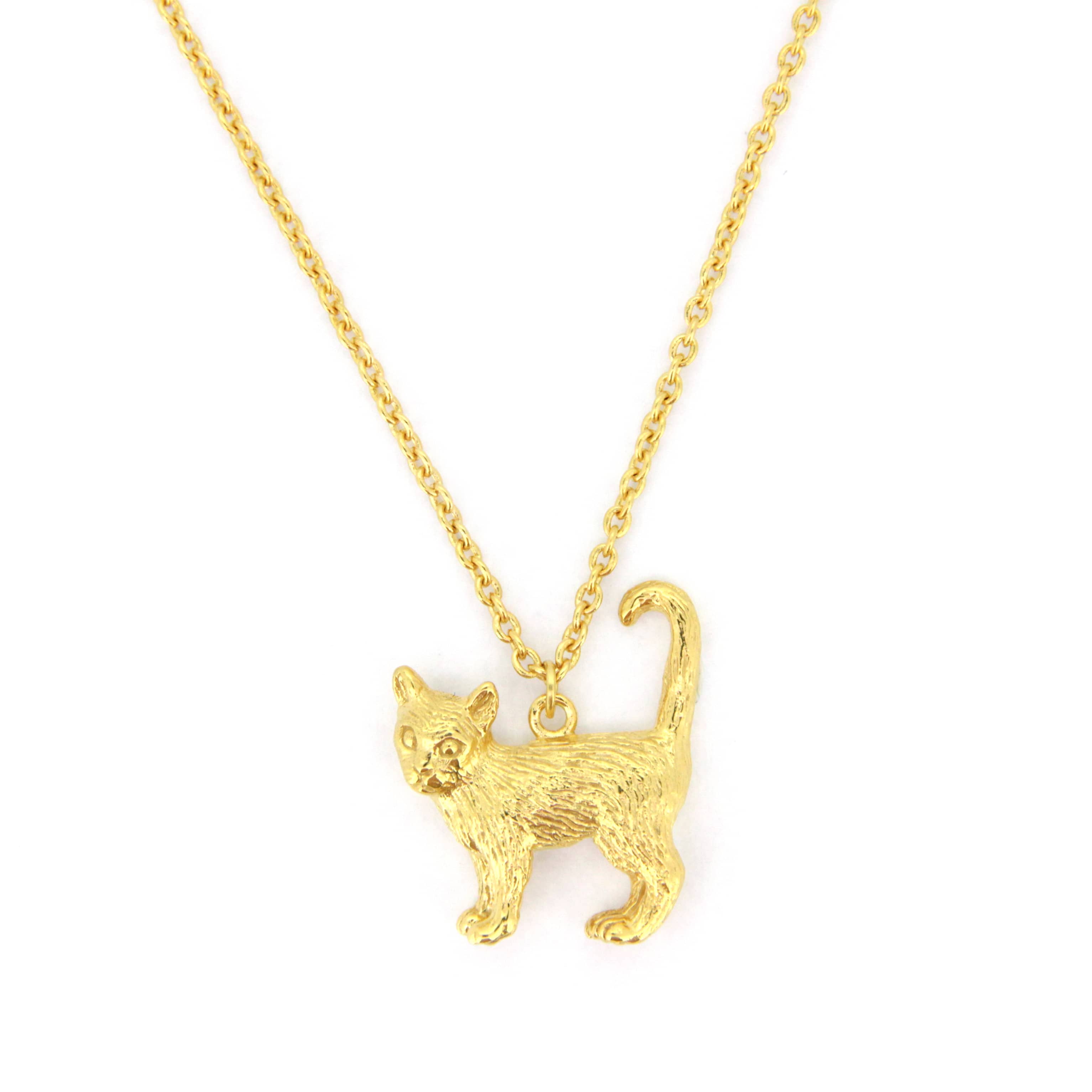 A whimsical gold pendant necklace featuring standing cat design with detailed fur texture.