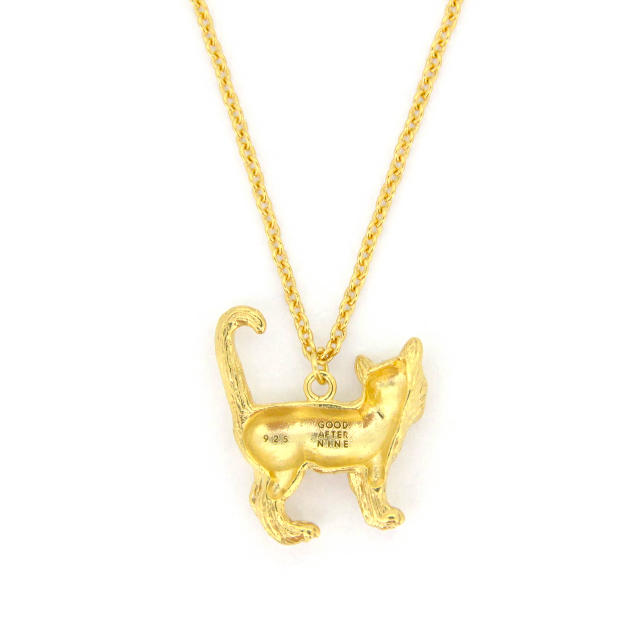 A whimsical gold pendant necklace featuring standing cat design with detailed fur texture.